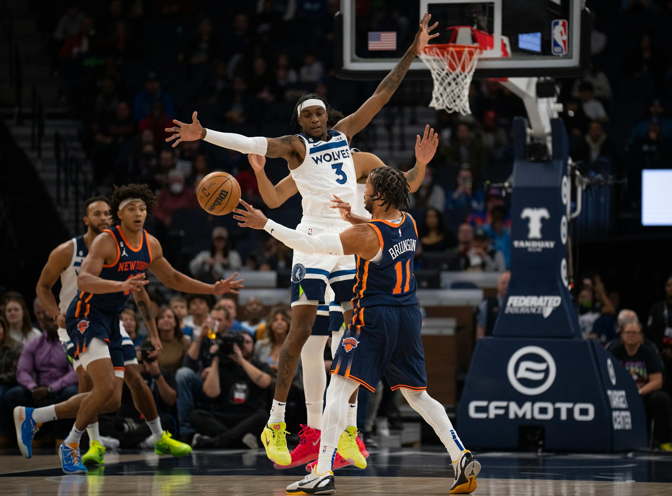Minnesota Timberwolves forward Jaden McDaniels (3) defended a pass by New York Knicks guard Jalen Brunson (11) in the first quarter of their game Monday, Nov. 7, 2022 at Target Center in Minneapolis. The Minnesota Timberwolves faced the New York Knicks in an NBA basketball game. ] JEFF WHEELER • Jeff.Wheeler@startribune.com