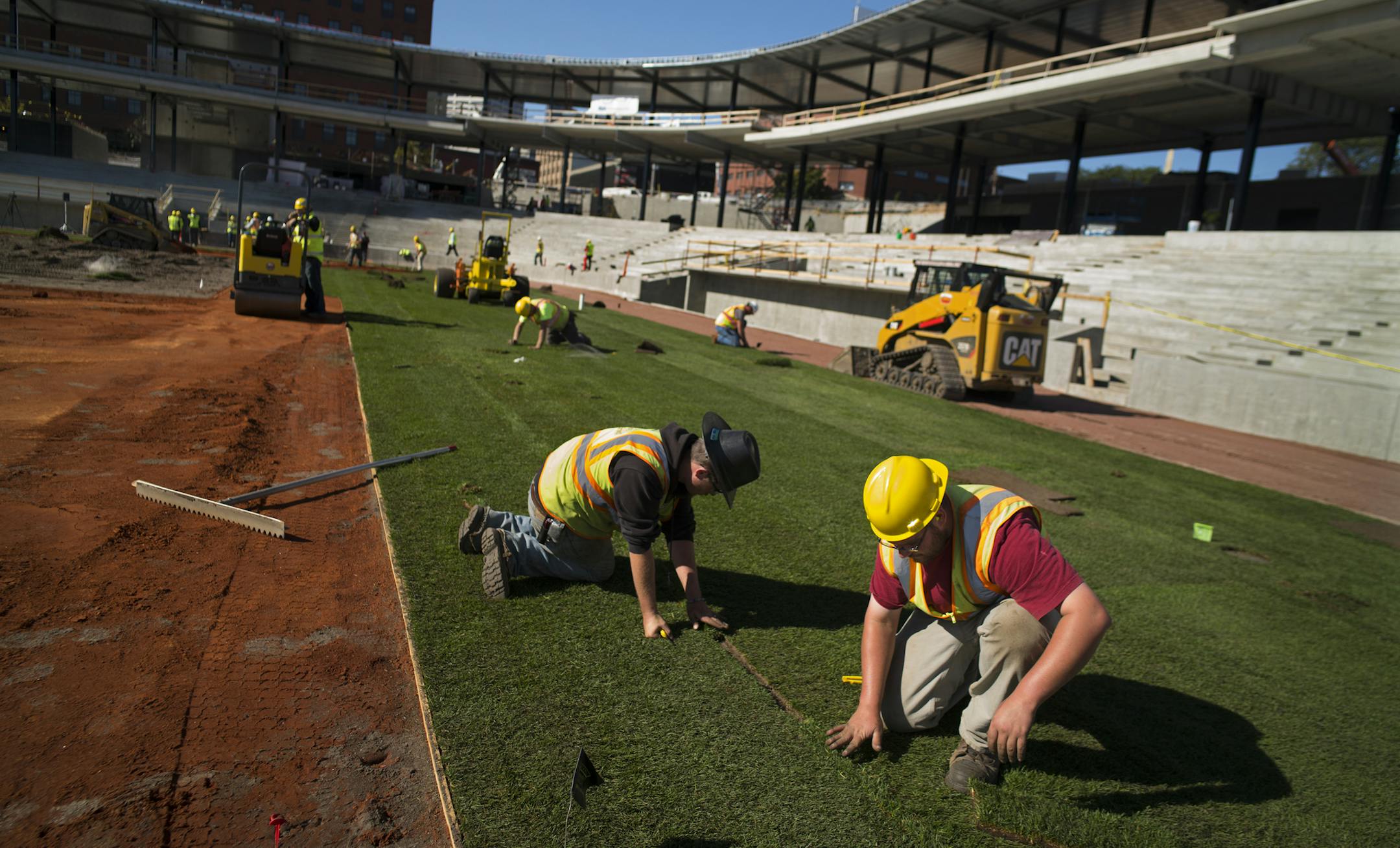 Crews will begin installing 95,000 square feet of specialized sod for the playing field at CHS Field on Wednesday, October 8. Mayor Chris Coleman and the St. Paul Saints mascot Mudonna were present ].Richard Tsong-Taatarii/rtsong- taatarii@startribune.com