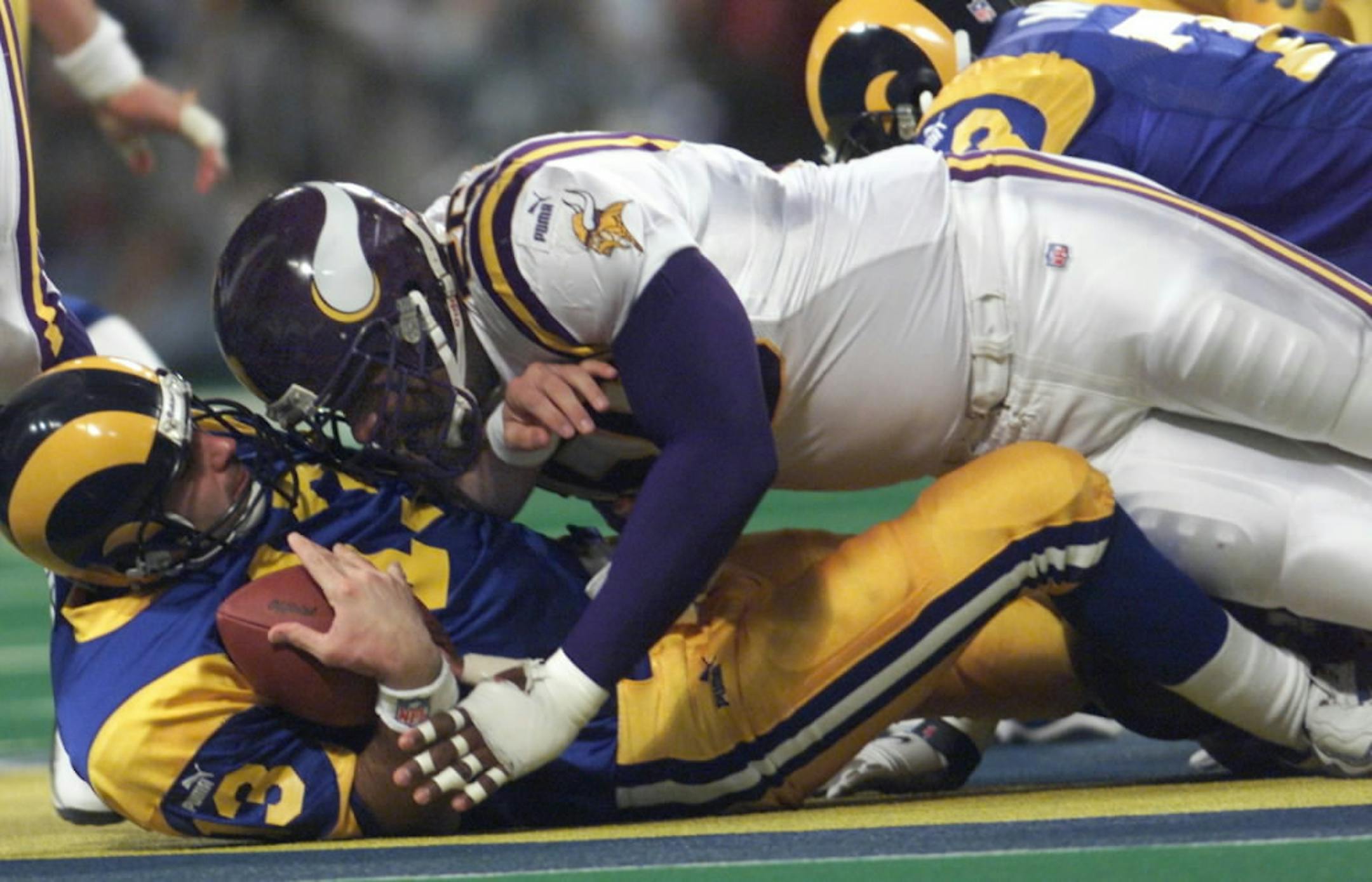 Jan. 18, 2000: Viking defensive end Chris Doleman sacks St. Louis Rams quarterback Kurt Warner.