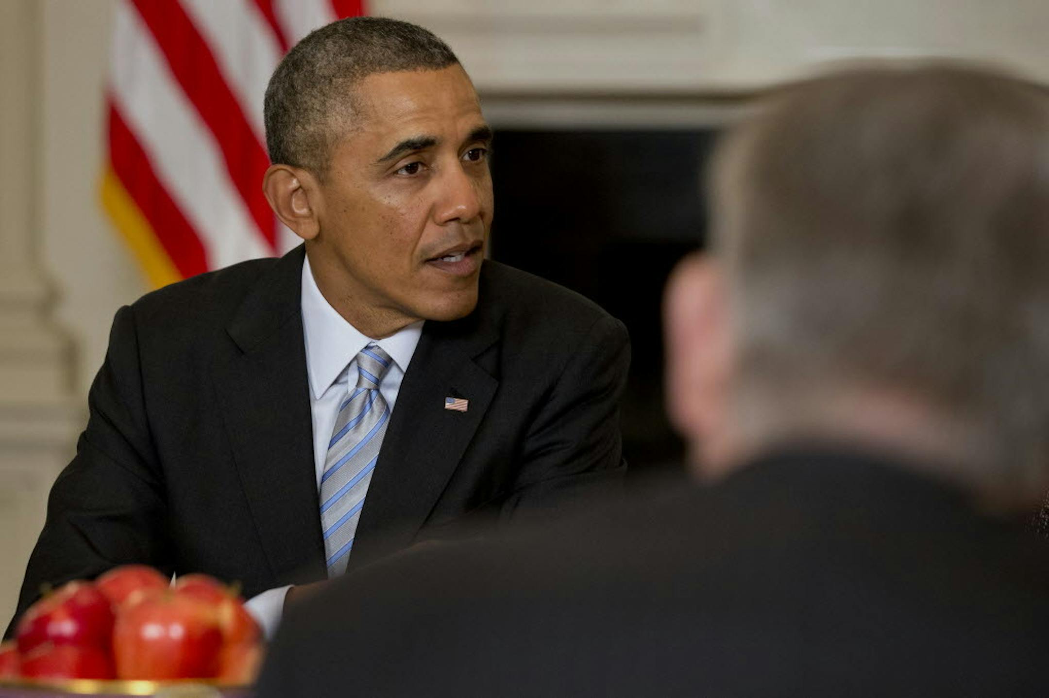 President Barack Obama meets with members of the Democratic Governors Association, Friday, Feb. 21, 2014, in the State Dining Room of the White House in Washington.