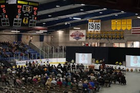 A memorial service for Henry Boucha was held Friday at Warroad’s ice arena.