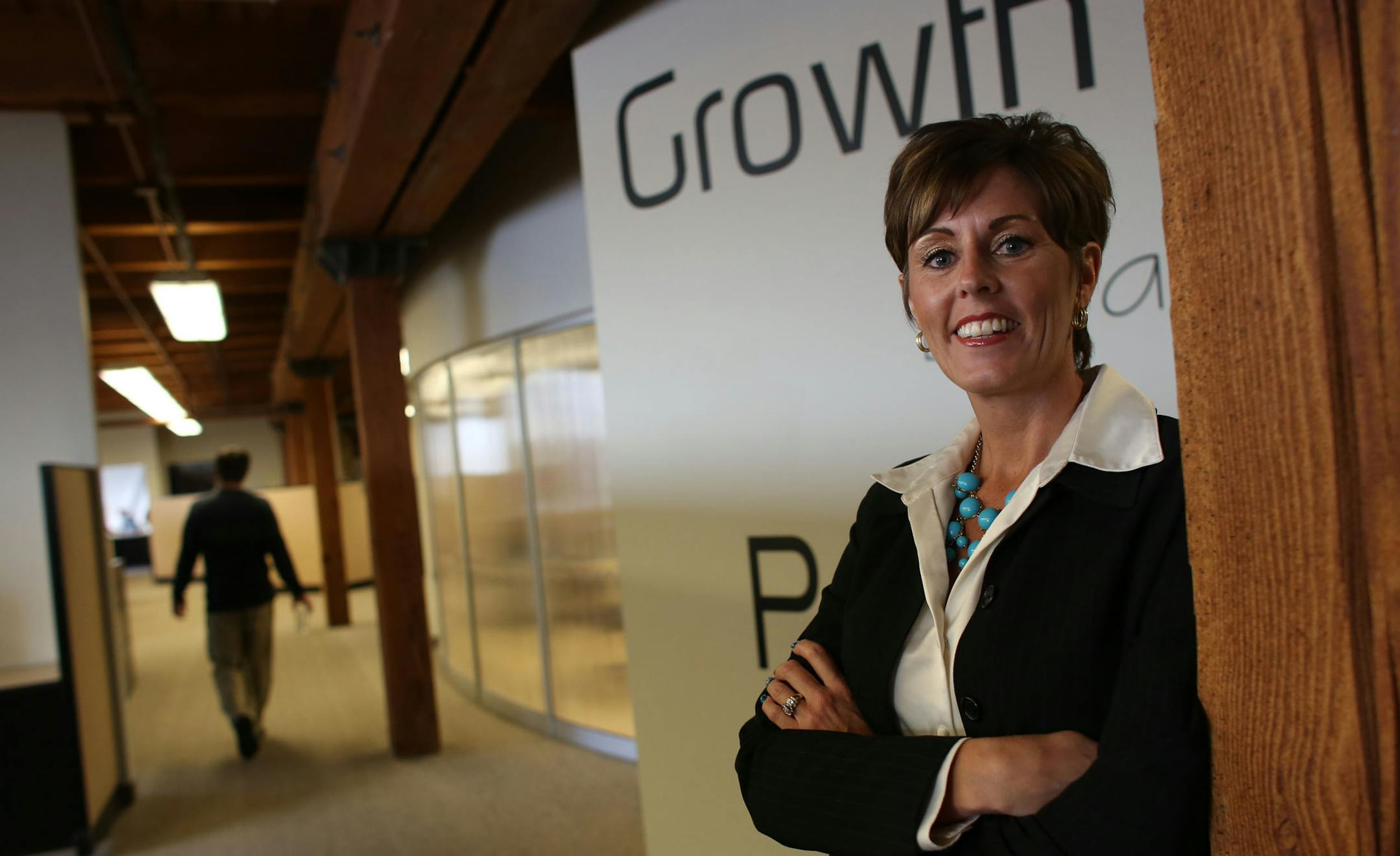 Traci Lehman , CEO of Cities Management, stood in their offices in Minneapolis Wednesday, December 18, 2013. Cities Management is a Twin Cities-based company that provides management services for community associations, including townhomes and condo buildings. ] (KYNDELL HARKNESS/STAR TRIBUNE) kyndell.harkness@startribune.com