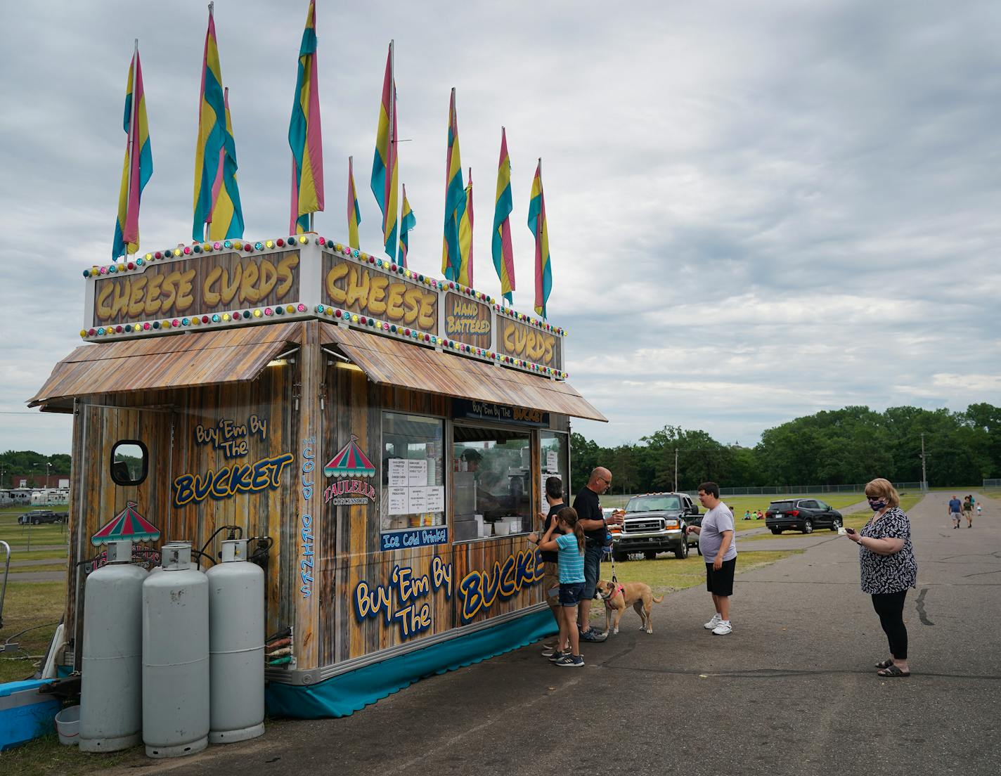 State Fair food vendors are setting up in parking lots, vacant county fairgrounds and grassy areas all over the metro area, to draw those hungry for a taste of what were formerly end-of-summer favorites. Many of the diners use this opportunity to picnic.