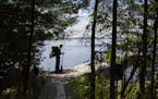 Cameron Giebink of Minneapolis starts on the Locator Lake Trail for a few days of backcountry camping on the Kabetogama Penninsula in Voyageurs Nation