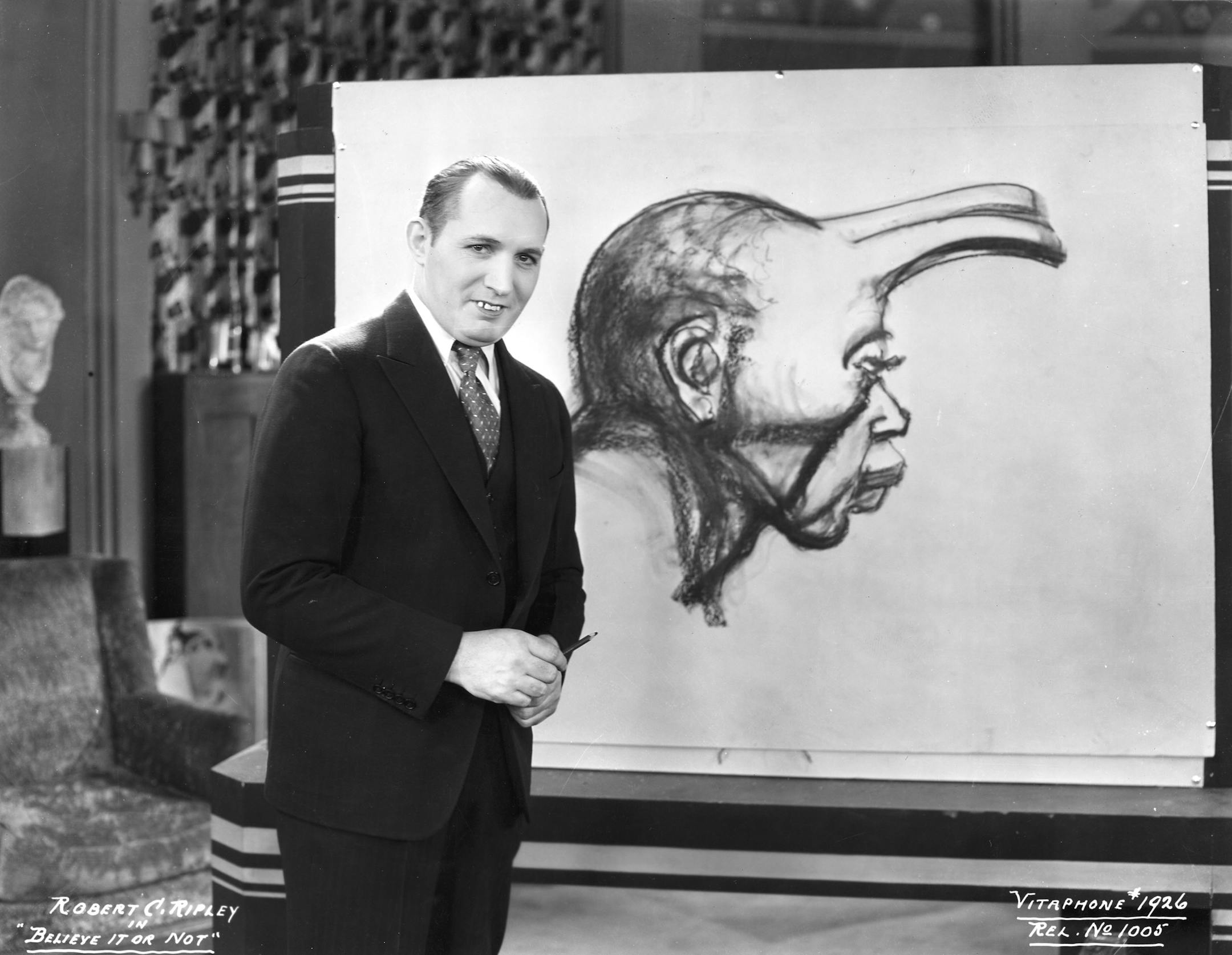 "Believe It or Not!" host Robert Ripley with the Horned Man of South Africa (1930) in "Ripley: Believe It or Not."