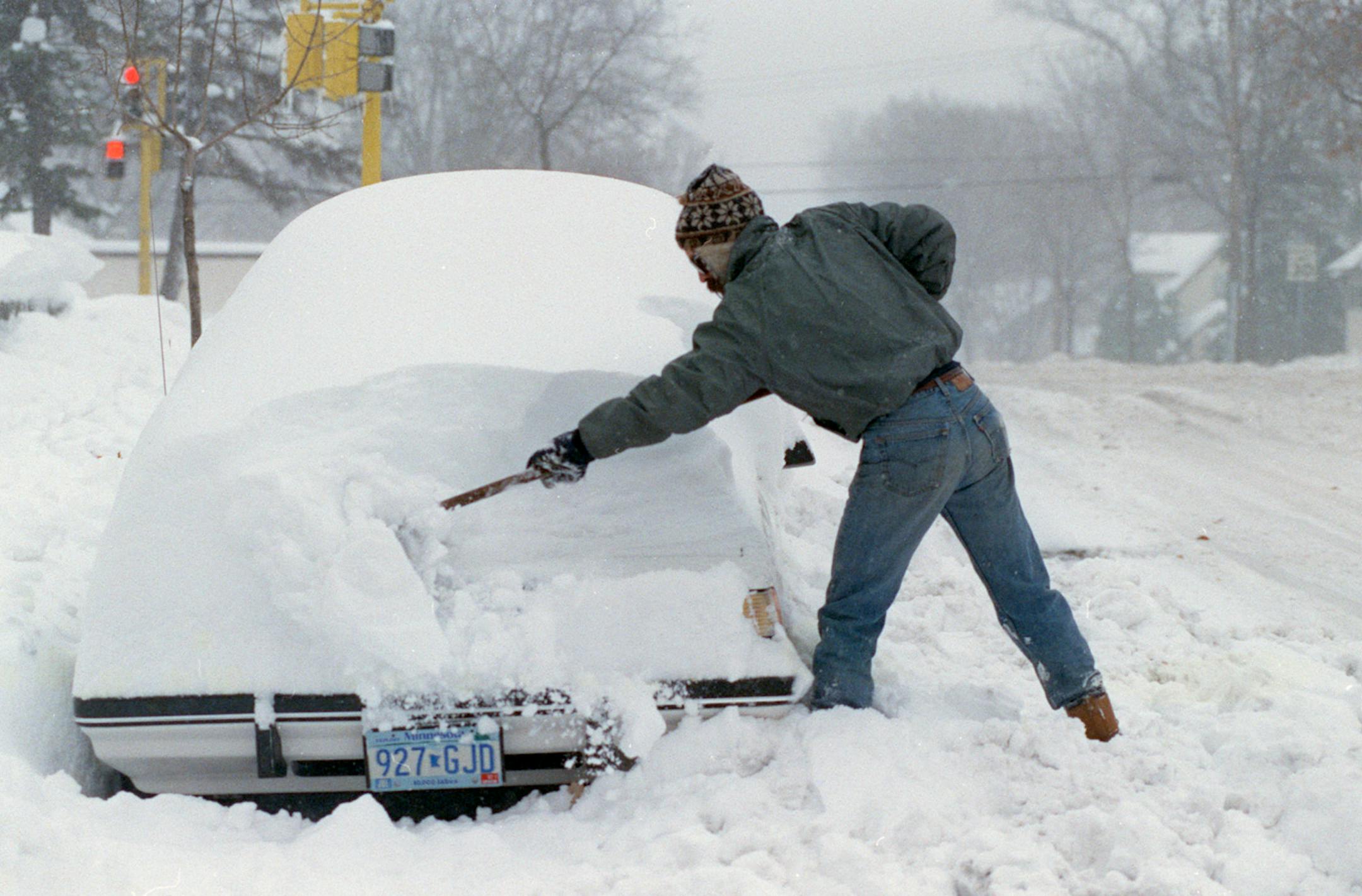 Halloween Blizzard, 1991. FILE PHOTO Minneapolis resident digs out on Nov 1, 1991.