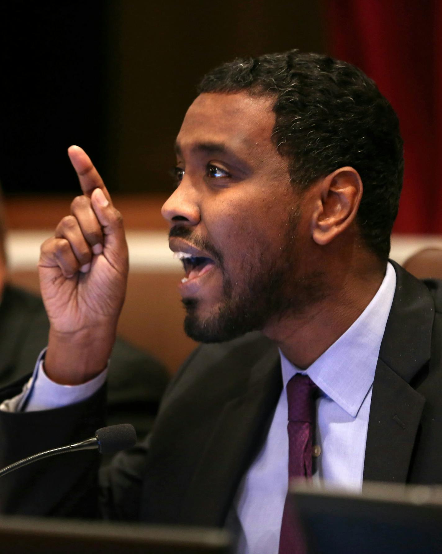 Council member Abdi Warsame spoke with passion about his reason for voting for the budget during a meeting in the city council chambers at City Hall in Minneapolis, Minn. on Wednesday, December 10, 2014. He was particularly passionnate with the assumtion that he didn't think "black lives matter," a chant the majority of community members against te budget chanted in the hallway during a break. ] RENEE JONES SCHNEIDER reneejones@startribune.com