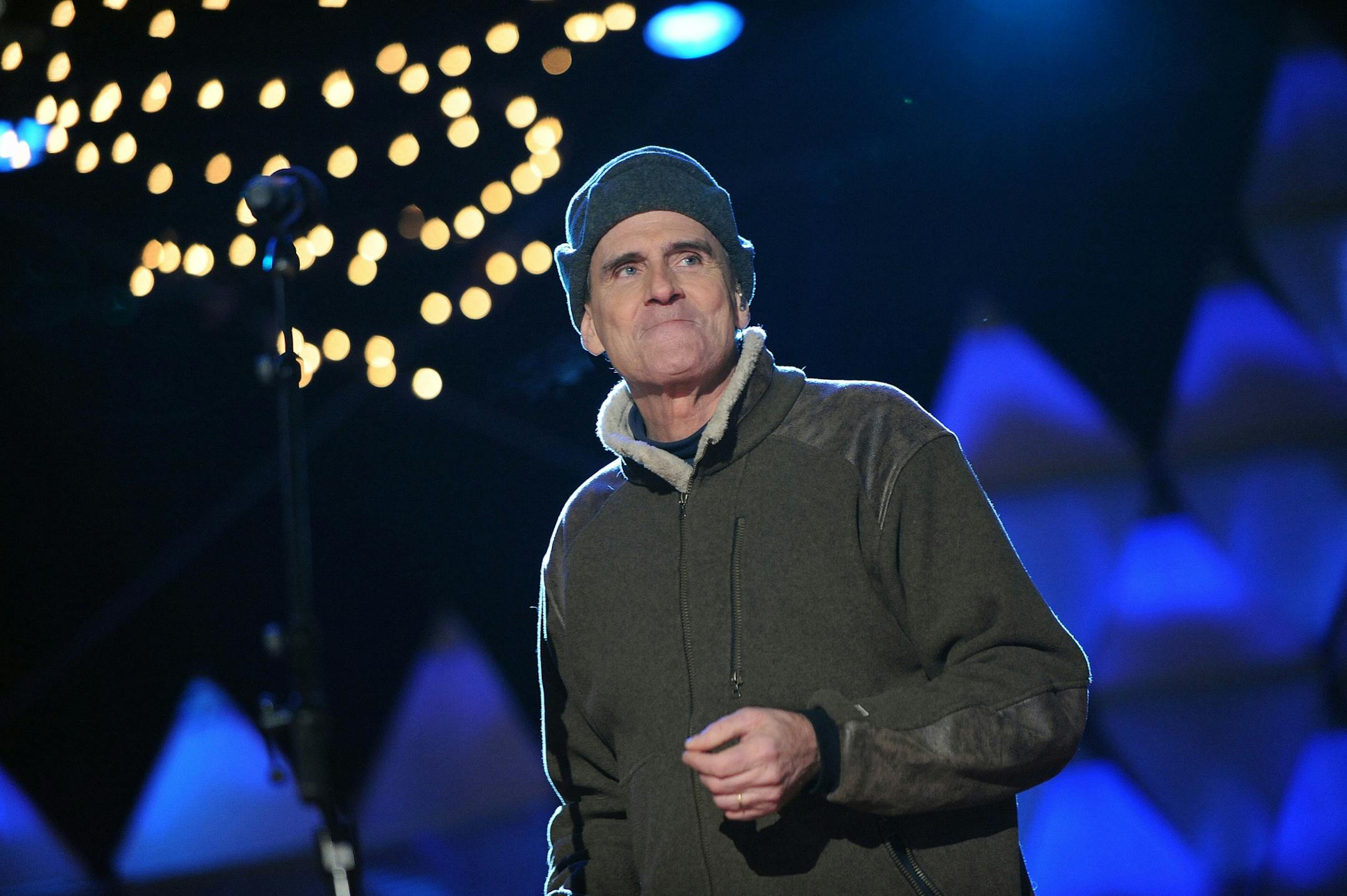 Singer James Taylor performs at a concert during the 90th National Christmas Tree Lighting Ceremony on the Ellipse behind the White House in Washington, D.C., on Thursday, December 6, 2012.
