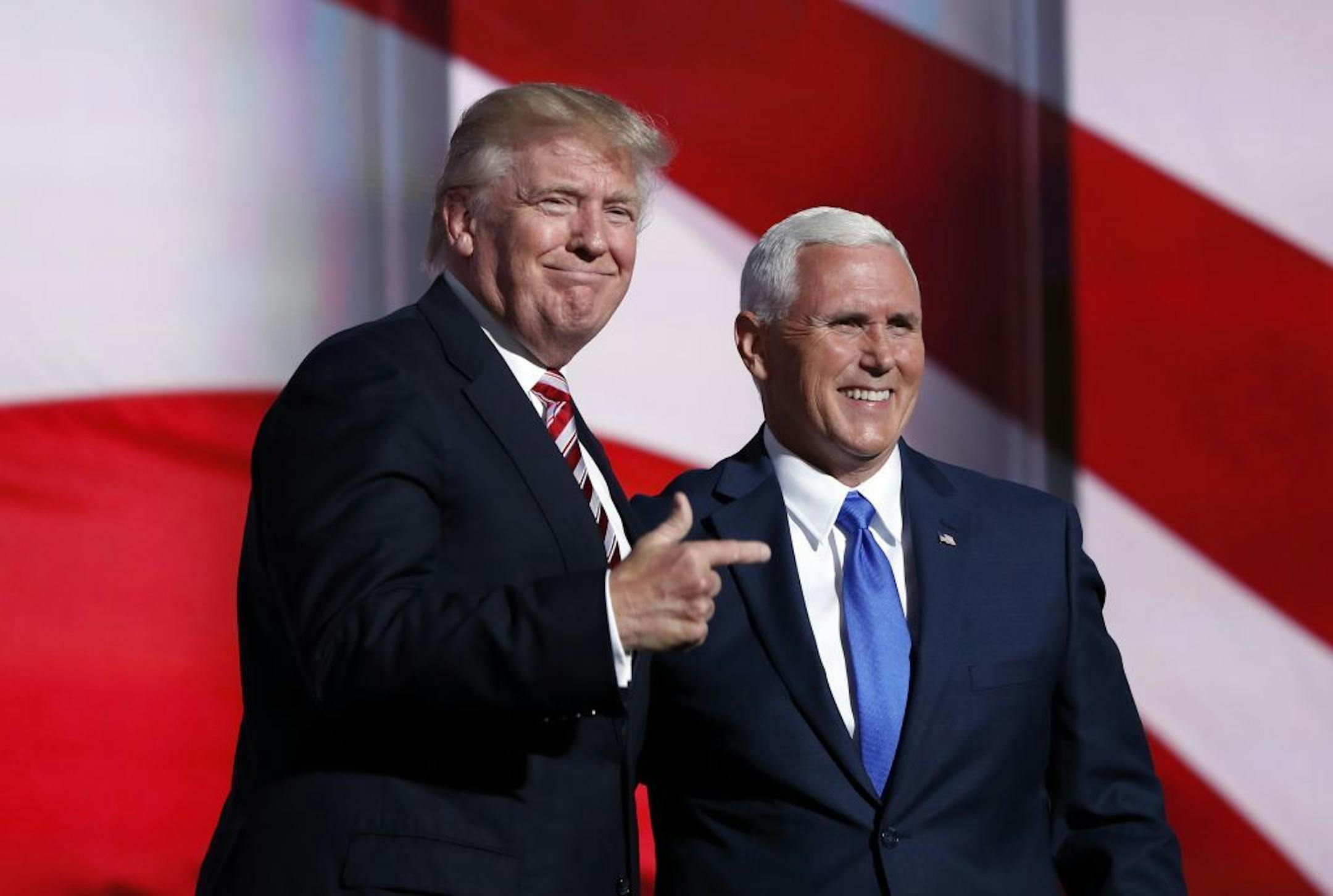 Republican Presidential Candidate Donald Trump, greets Republican Vice Presidential Nominee Gov. Mike Pence of Indiana during the third day session of the Republican National Convention in Cleveland, Wednesday, July 20, 2016.