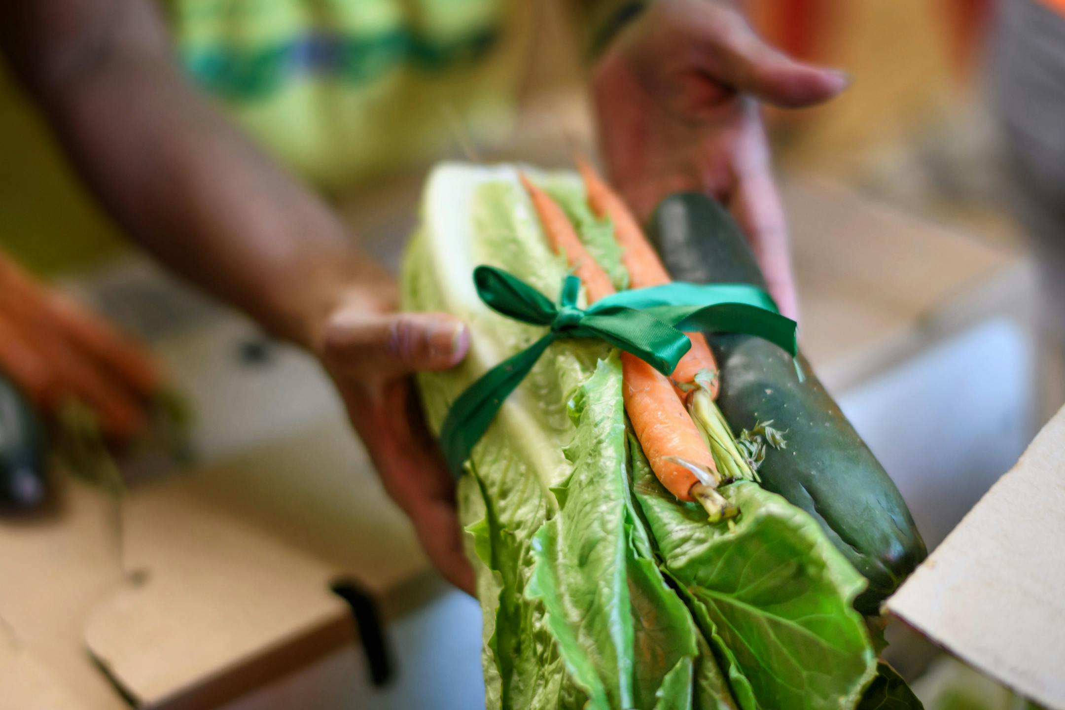 Links volunteers Tasha Ransom, Natalie Dixon, and Agape staff member Pethuel LeFlore-Cole, helped assemble 100 bags with two meals for Agape Childhood Development Center's 178 kids to take home to their families. ] GLEN STUBBE • glen.stubbe@startribune.com Tuesday June 6, 2017 800 African American women descend on the Twin Cities for service projects. 100 Links members worked on a service project at Agape Childhood Development Center in North Minneapolis.EDS: Agape serves 178 kids from 95