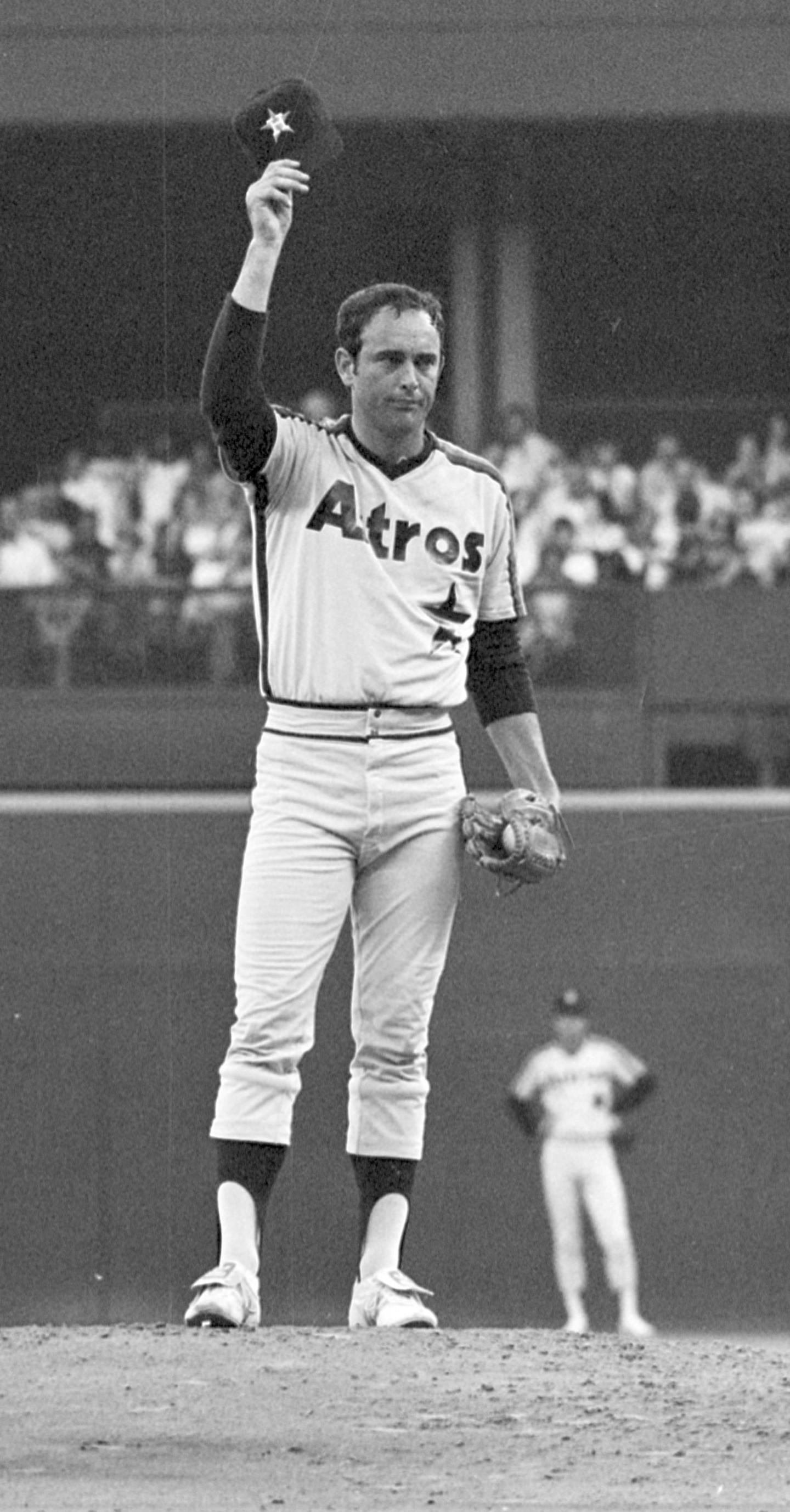 SPECIAL TO FT. WORTH STAR TELEGRAM - Houston Astros' pitcher MNolan Ryan tips his hat to a cheering crowd after striking out Cincinnati Reds' batter Cesar Geronimo in the second inning of a game with the Reds, Friday July 4, 1980 in Cincinnati, Ohio. The strikout made Ryan only the fourth player in major league history to reach the 3,000 mark. (AP Photo) ORG XMIT: APHS44133