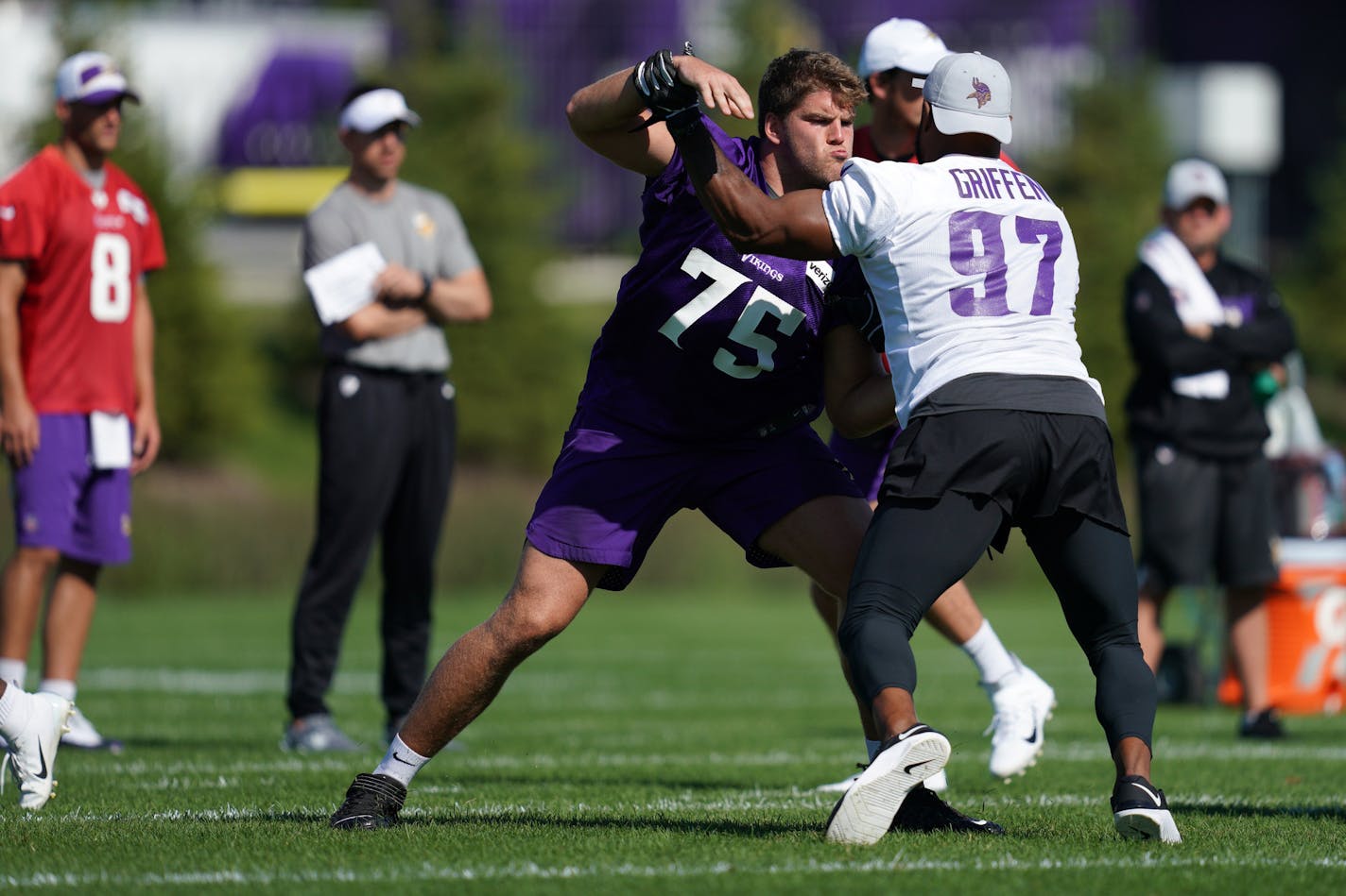 Minnesota Viking tackle Brian O'Neill (75) held back defensive end Everson Griffen (97) for a drill during training camp Friday. ] ANTHONY SOUFFLE • anthony.souffle@startribune.com Minnesota Vikings players and coaches took part in training camp Saturday, July 27, 2019 at the TCO Performance Center in Eagan, Minn.