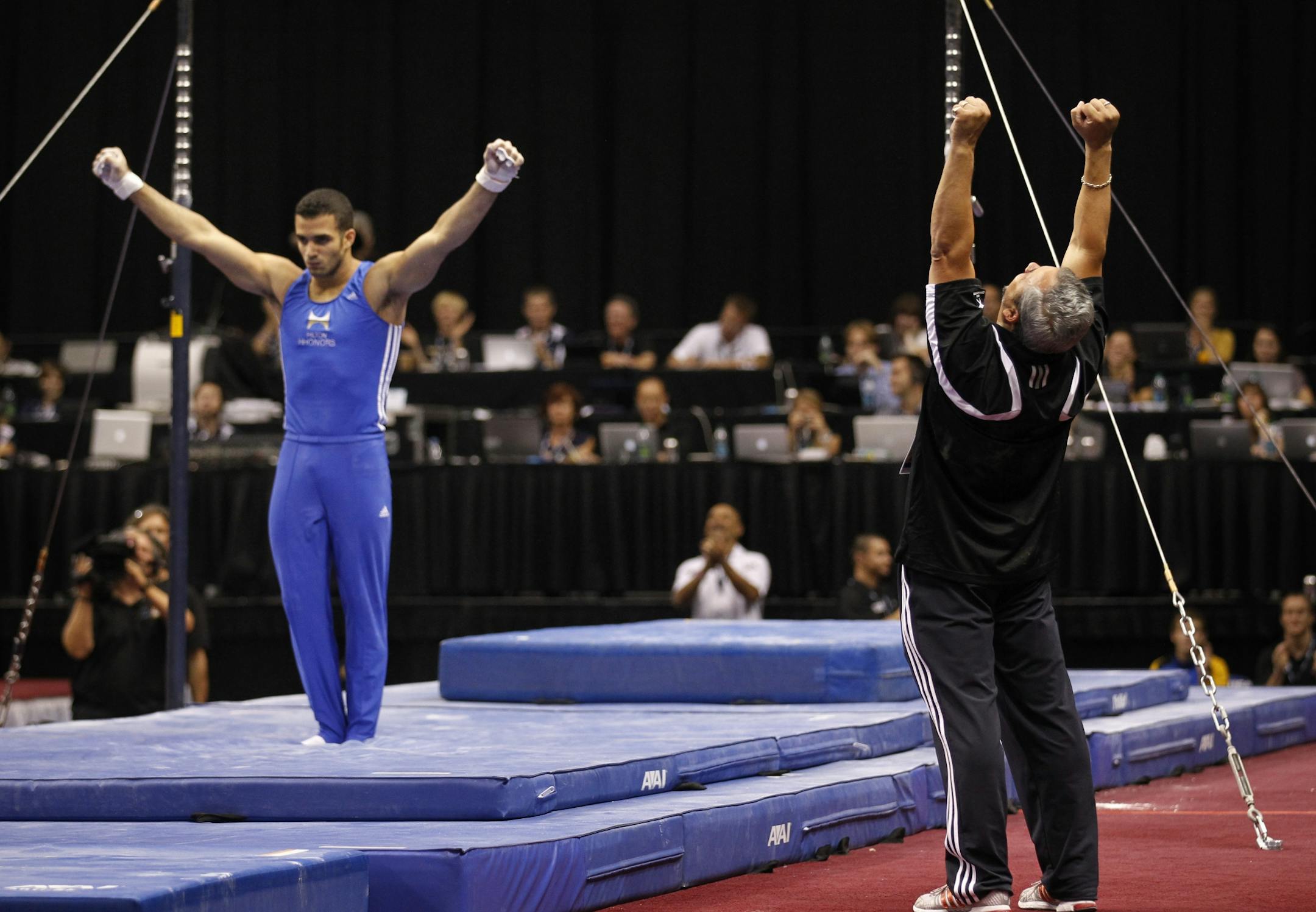 Danell Leyva finished his superb high bar routine -- acknowledged by his coach and stepfather, Yin Alvarez -- and clinched his men's championship Friday night at the USA Gymnastics national championships at Xcel Energy Center.