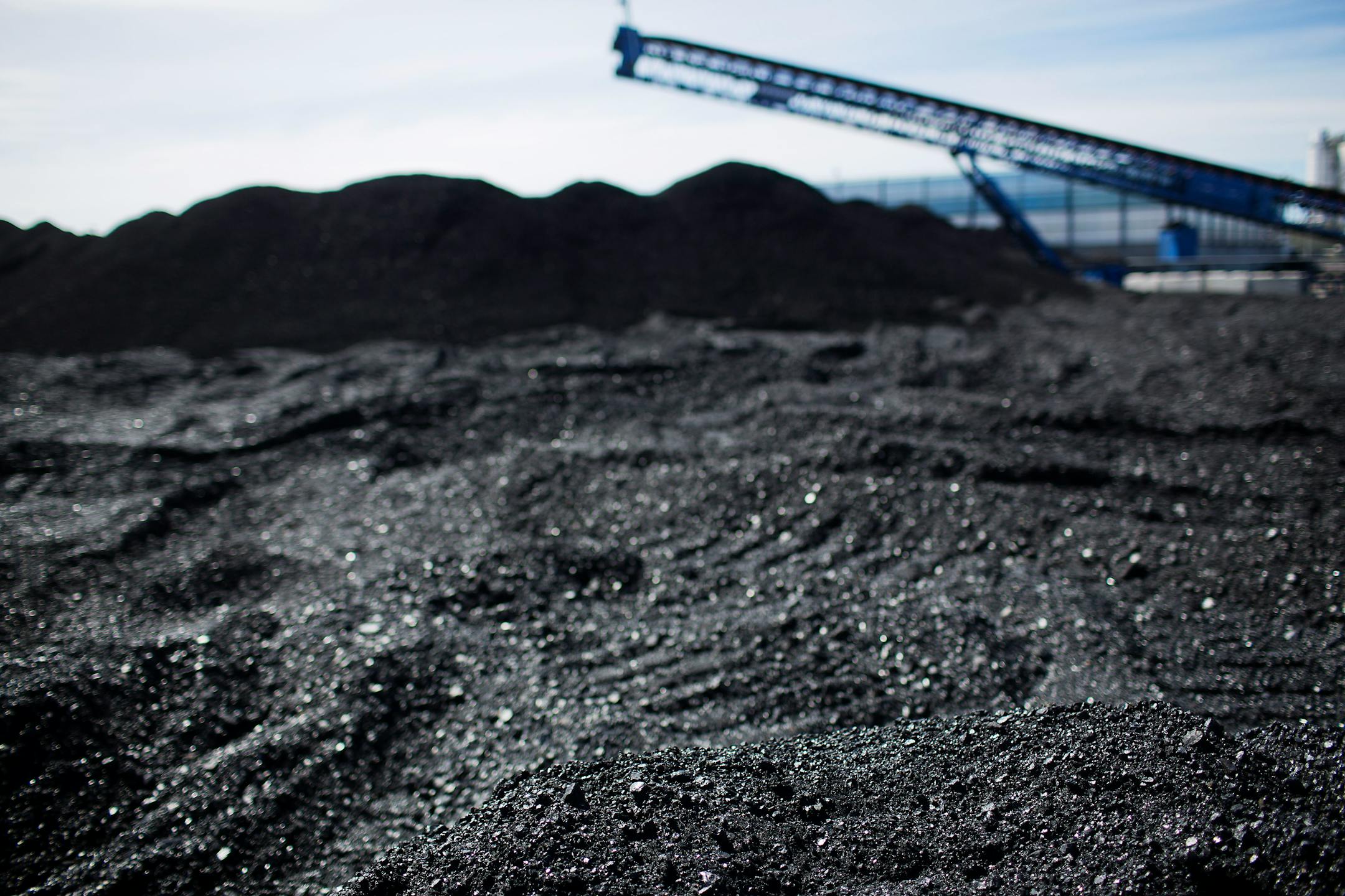 Coal is stored at the Port of Stockton in Stockton, California, U.S., on Friday, March 7, 2014. Wholesale trade figures are scheduled to be released on Feb. 11. Photographer: Victor J. Blue/Bloomberg