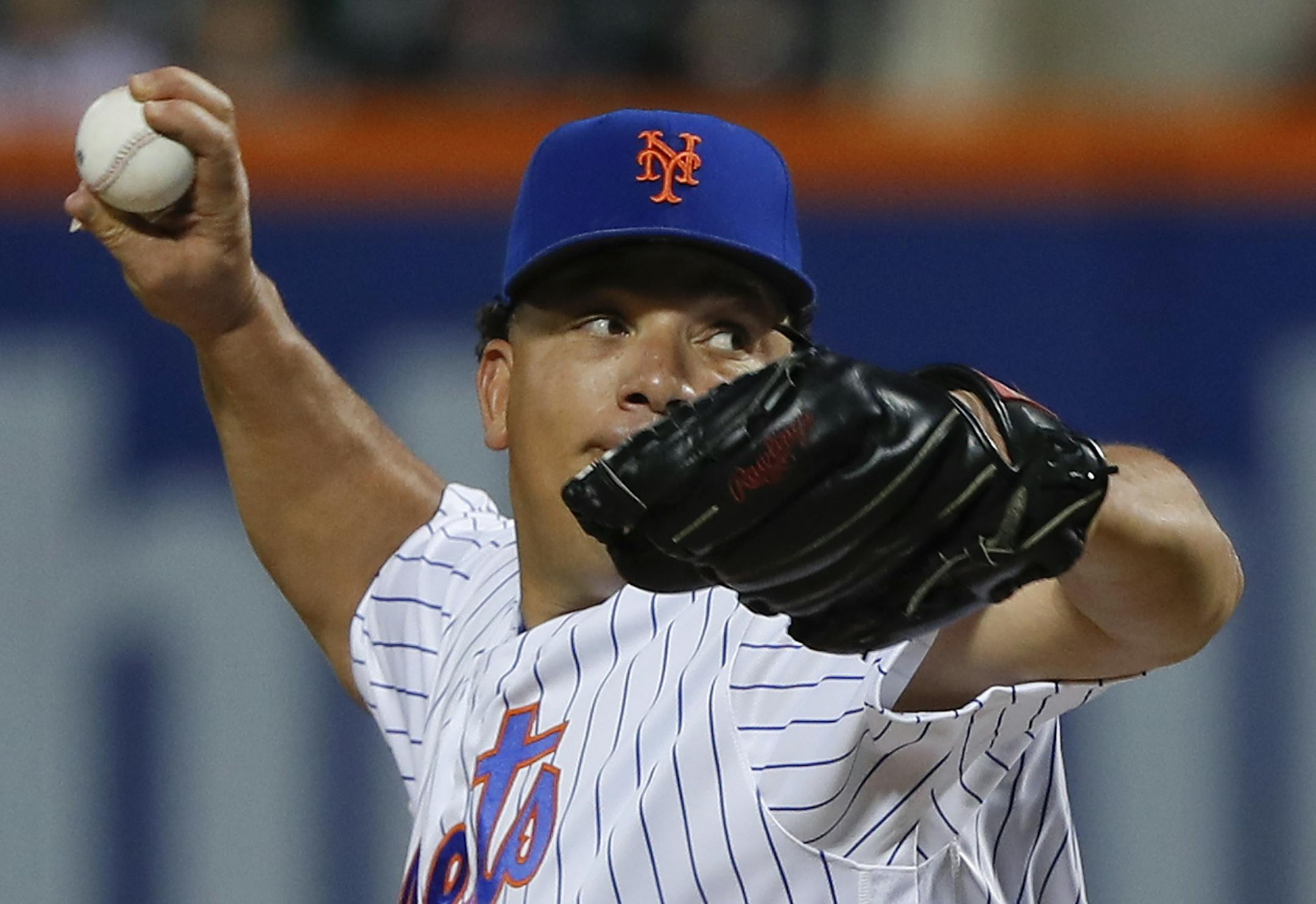 New York Mets starting pitcher Bartolo Colon delivers against the Minnesota Twins during the first inning of a baseball game, Friday, Sept. 16, 2016, in New York.