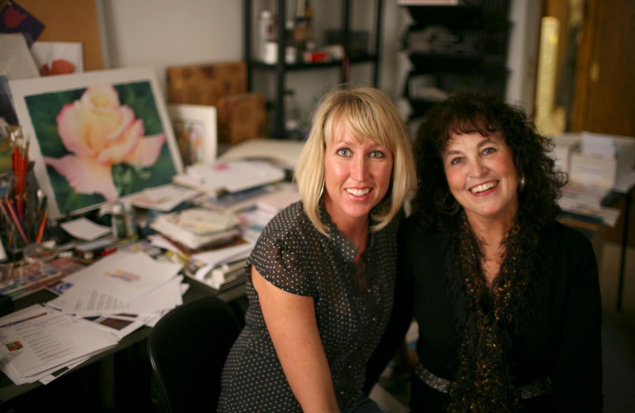 Stroke of the Heart C.O.O. Kristin Noraker, left, with her mom, owner and Art Director Kevyn Riley in Riley's office in Minnetonka recently.