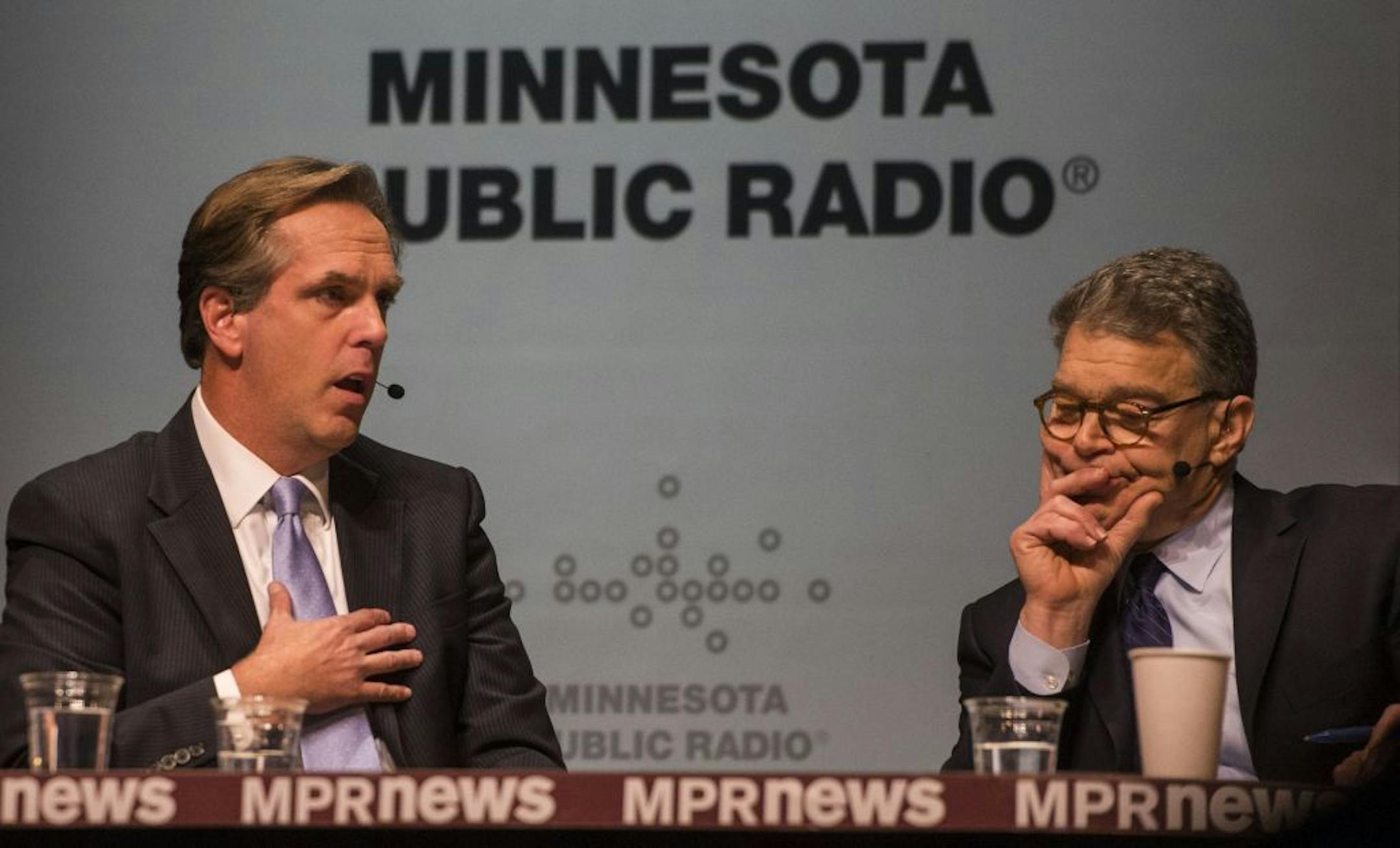 Mike McFadden, left, and incumbent Sen. Al Franken, D-Minn., meet at the Fitzgerald Theater in St. Paul, Minn. on Sunday, Nov. 2, 2014, in their final debate before the election for the U.S. Senate seat.