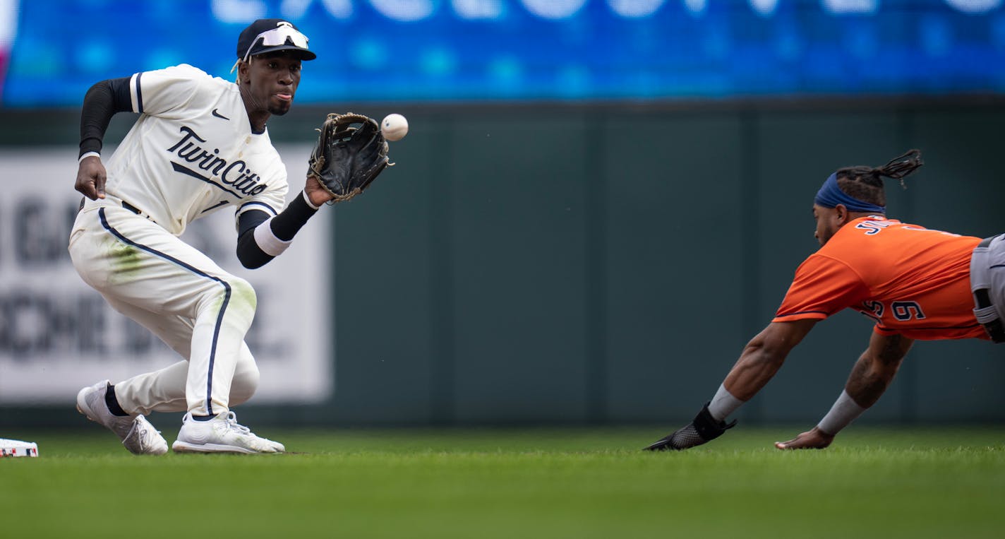 Houston Astros right fielder Corey Julks (9) was tagged out by Minnesota Twins second baseman Nick Gordon in the third inning Sunday April 9,2023 in Minneapolis, Minn.] JERRY HOLT • jerry.holt@startribune.come