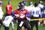 Minnesota Vikings quarterback Teddy Bridgewater worked on drills with trainer Tom Hunkele Wednesday May 31,2017 in Eden Prairie, MN.