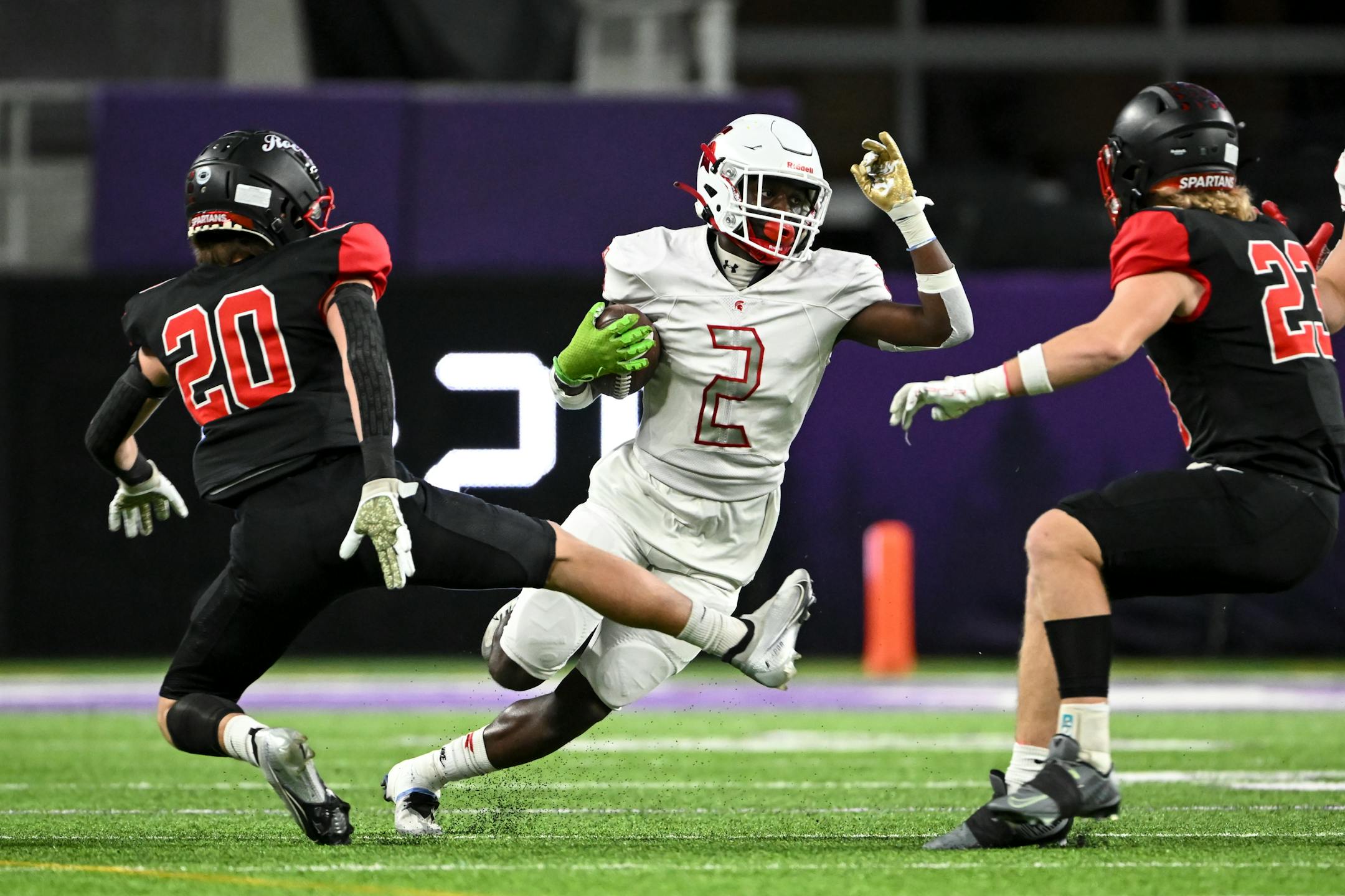 Simley wide reciever La'tayvion McCoy-Nunn (2) runs the ball for a first down against Rocori during the first half of a Class 4A semifinal playoff game Thursday, Nov. 17, 2022 at U.S. Bank Stadium in Minneapolis, Minn.
