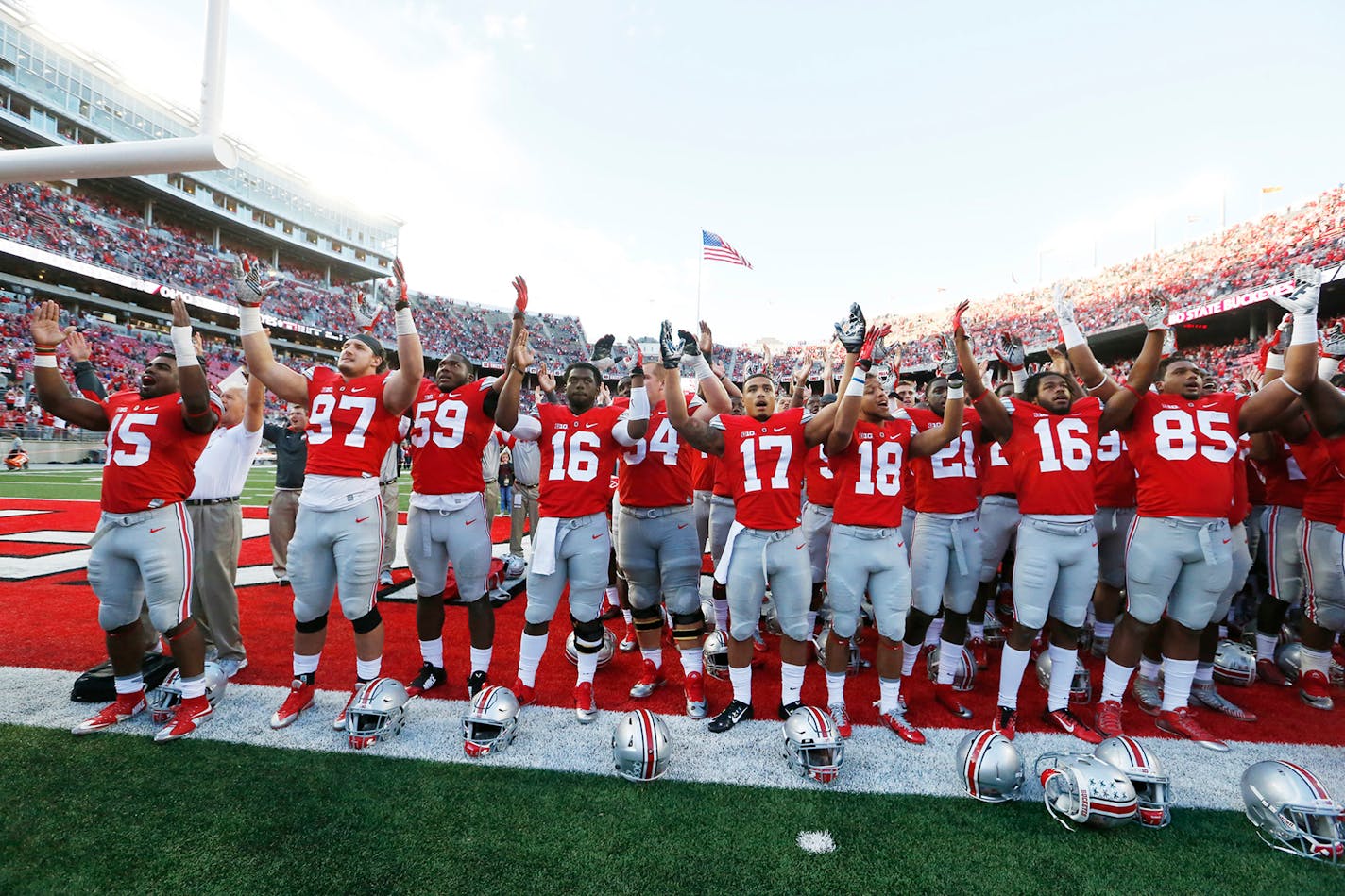 Players sing Carmen Ohio at the end of Ohio State's 38-0 win against Hawaii at Ohio Stadium in Columbus, Ohio, on Saturday, Sept. 12, 2015. Ohio State won, 38-0. (Fred Squillante/Columbus Dispatch/TNS) ORG XMIT: 1173684