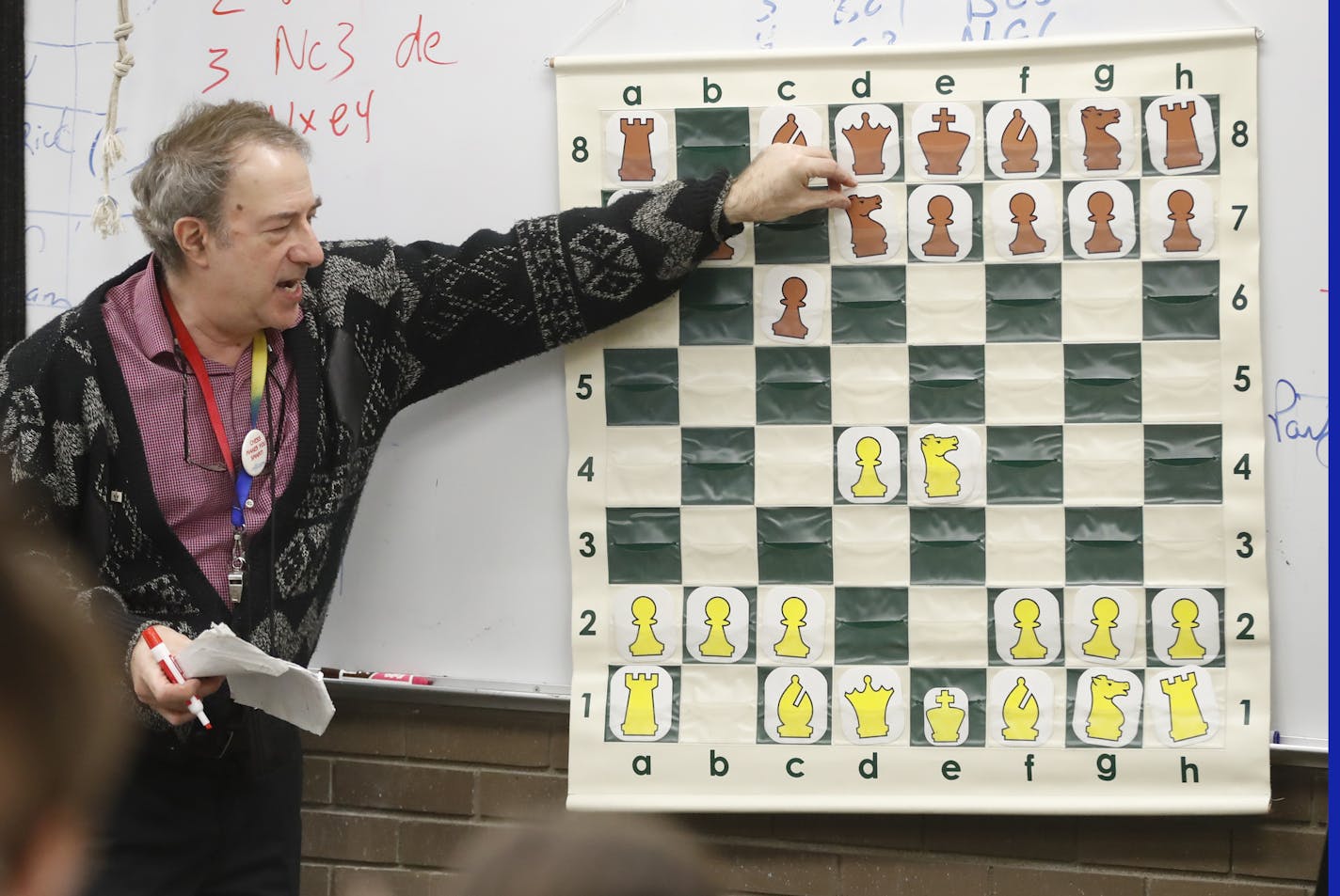 Chess coach Brian Ribnick shows players a few traps to set up or avoid at the beginning of a game.] The Burnsville Metcalf Junior High School chess team lost out on a national championship to a school from Texas which now has been found to have cheated in a scheme directed by the team's coach.RICHARD TSONG-TAATARII &#xa5; richard.tsong-taatarii@startribune.com