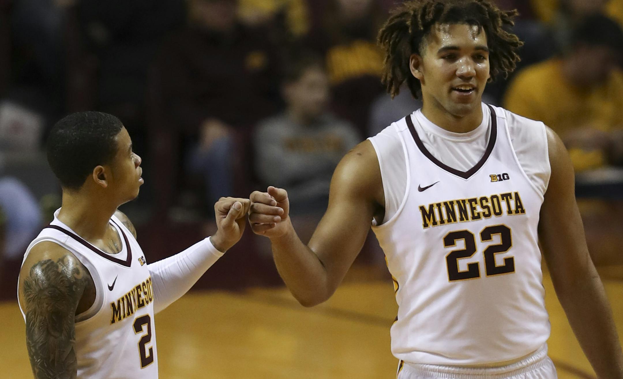 Minnesota Gophers guard Nate Mason (2) and center Reggie Lynch (22) bumped fists while a teammate shot a free throw in the first half. ] JEFF WHEELER ï jeff.wheeler@startribune.com The University of Minnesota men's basketball team faced Rutgers in a Big 10 conference game Sunday evening, December 3, 2017 at Williams Arena in Minneapolis.