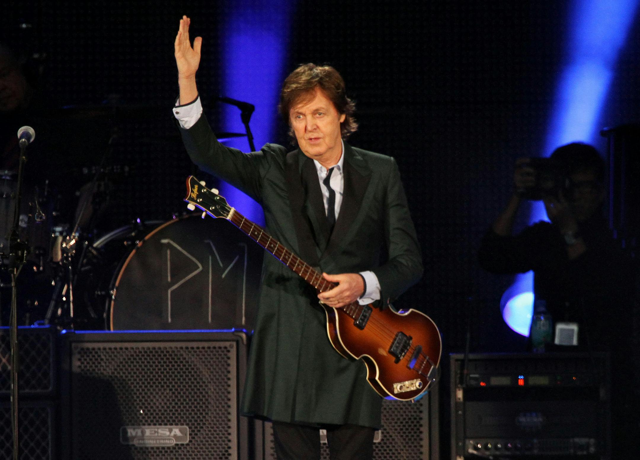 FILE - This July 9, 2013 file photo shows Paul McCartney performing at Fenway Park in Boston, Mass. McCartney celebrated his 2-year wedding anniversary with his wife and few hundred students.The 71-year-old performed at the Frank Sinatra School of the Arts in the borough of Queens on Wednesday. McCartney said “happy anniversary baby” to Nancy Shevell before going into his latest song, “New.” (Photo by Marc Andrew Deley/Invision/AP, File)