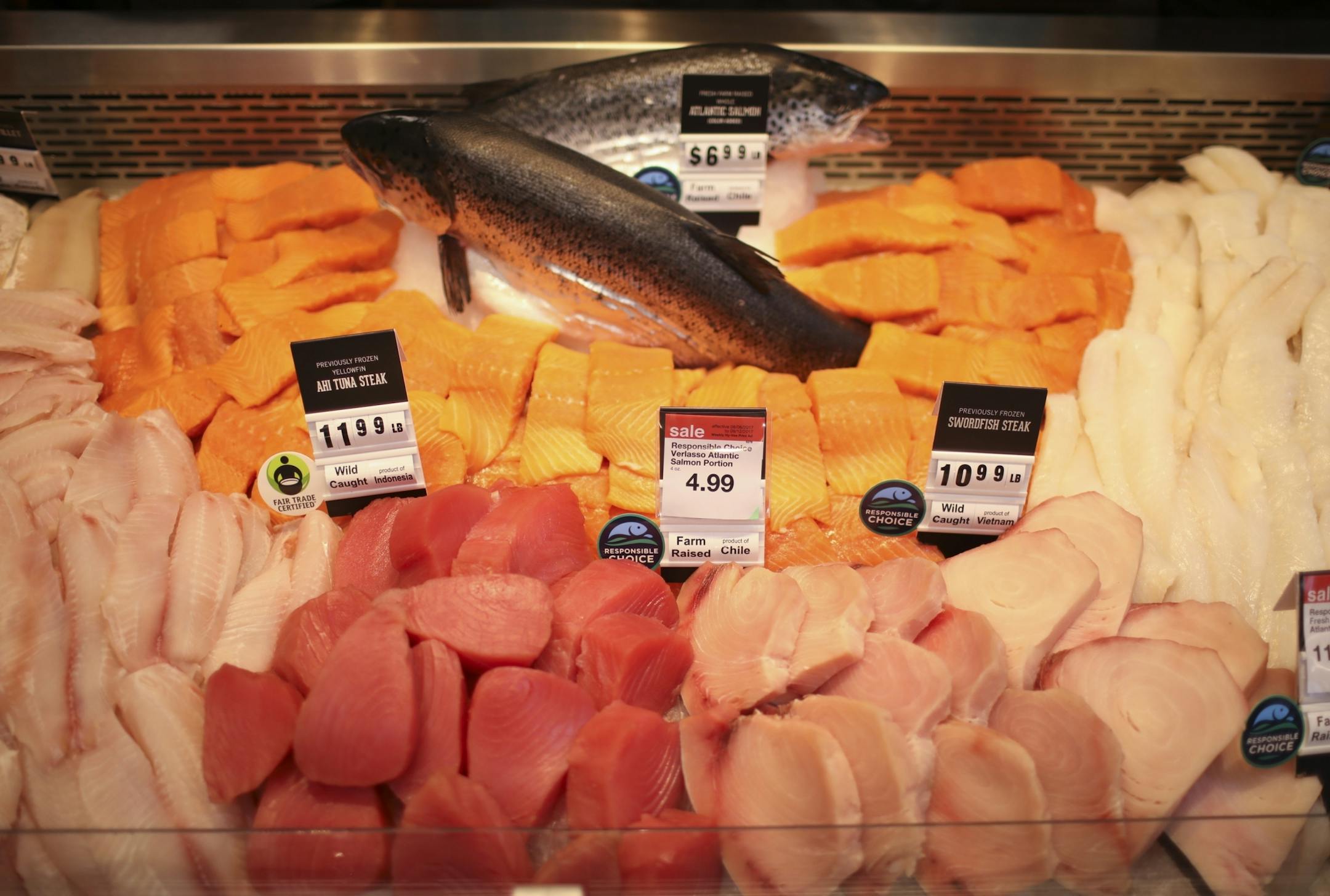 Sustainably harvested and Fair Trade certified choices are among the fresh seafood options at the newest Hy-Vee store in Cottage grove Monday afternoon.