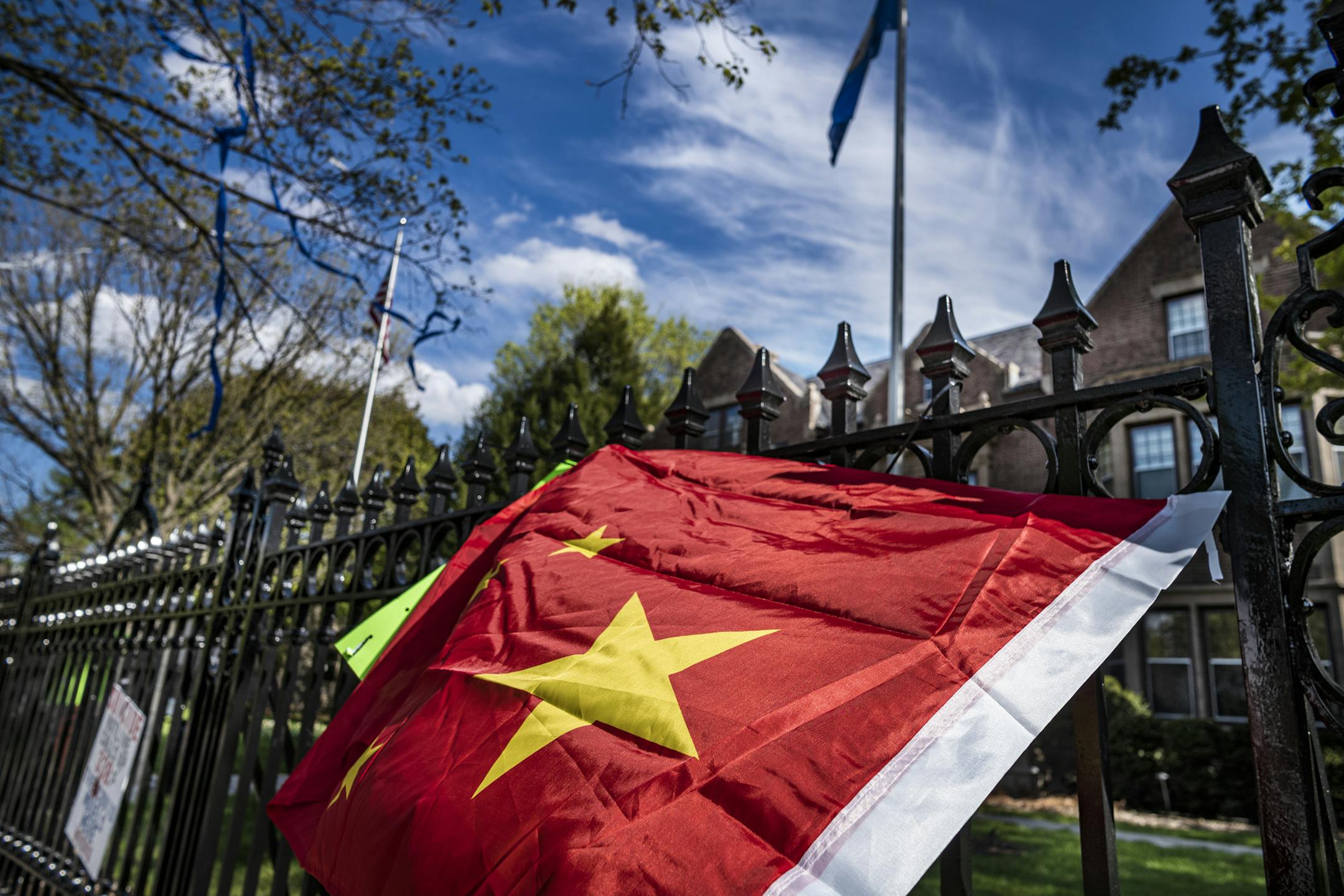Cordarrel Lyrek affixed a sign o the governor's mansion accusing the government of trying to eliminate the cash economy as well as tracking people who have been vaccinated with microchips. He also wants the economy to open up. The other signs were from protesters earlier in the day.] A look at the politics and other factors behind Gov. Tim Walz's decision to relax stay-home orders and reopen businesses. Was this always the plan? Or did he bow to political pressure, particularly from the GOP?RICH