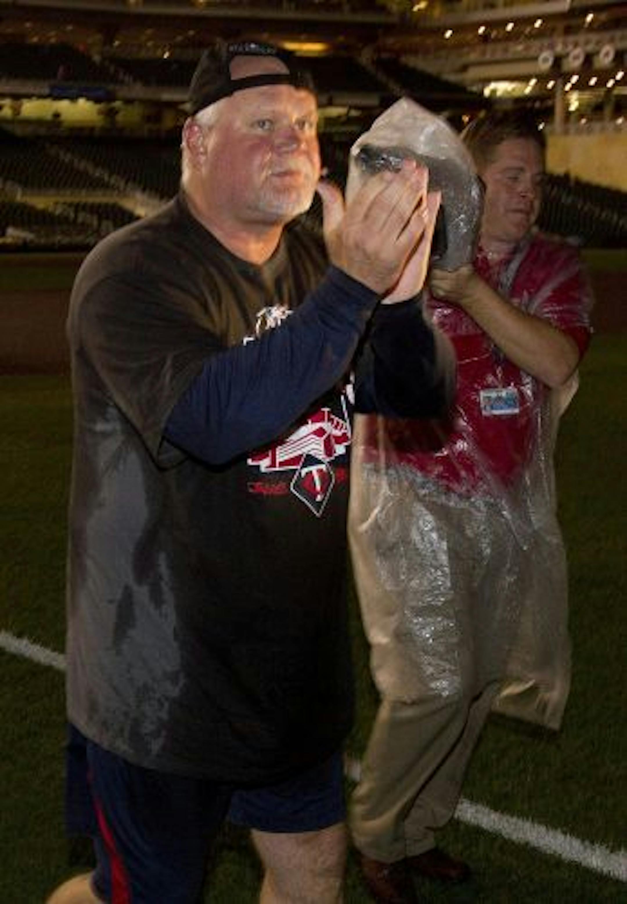 Twins manager Ron Gardenhire celebrated with the team after clinching the American League Central Division title late Wednesday night.