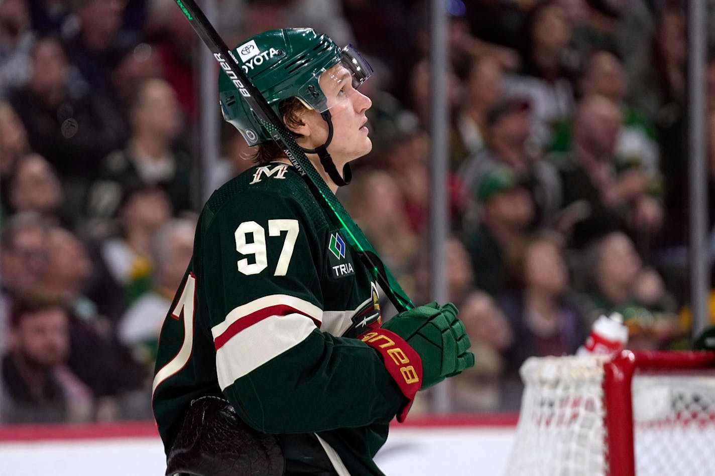 Minnesota Wild left wing Kirill Kaprizov (97) looks up at the video board during the third period of an NHL hockey game against the Winnipeg Jets, Tuesday, April 11, 2023, in St. Paul, Minn. (AP Photo/Abbie Parr)