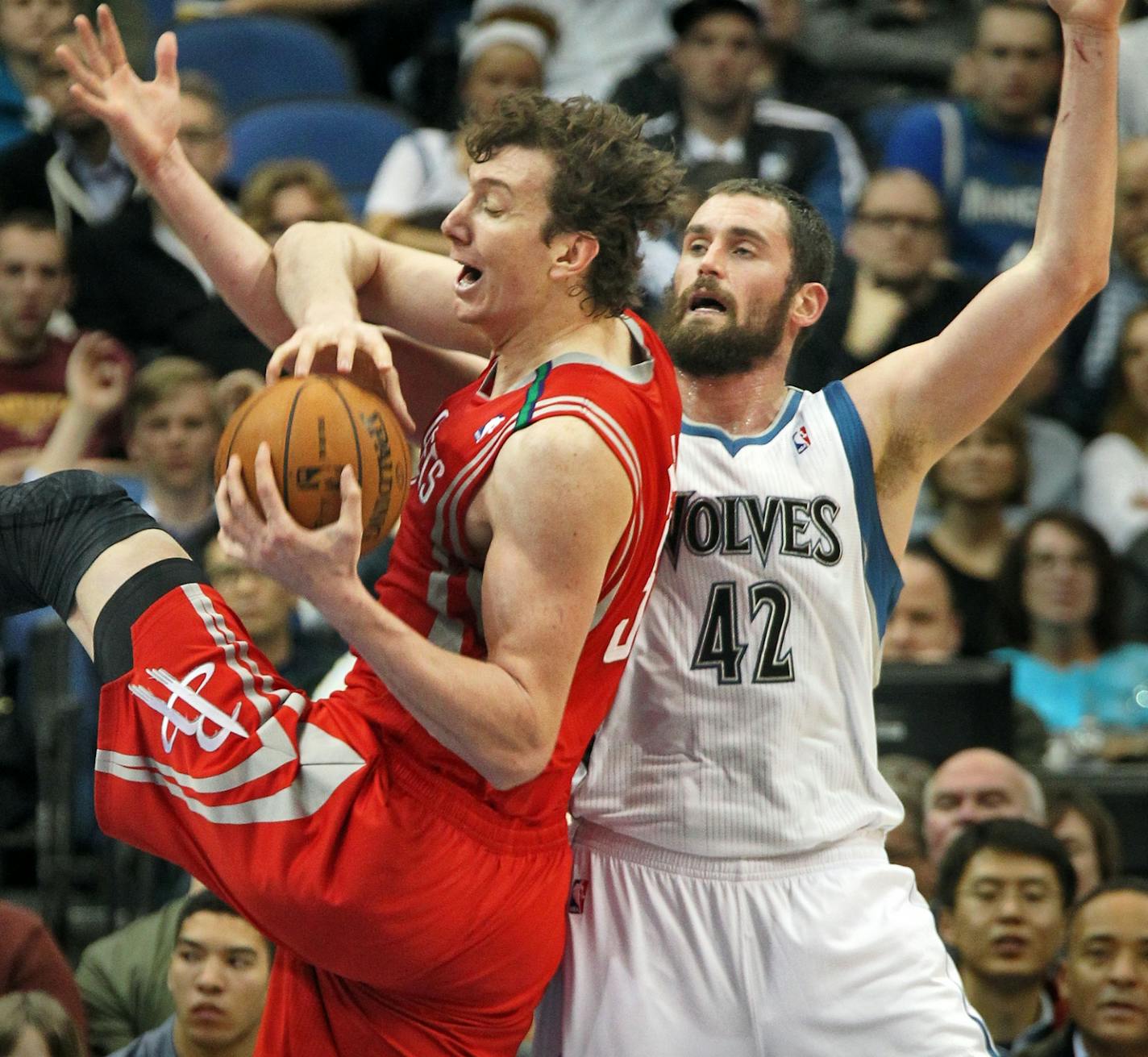 Timberwolves forward Kevin Love (right) returned to action on Wednesday with all the blood gone from his poked eye and without protective goggles and the accompanying sky hook that must accompany them.