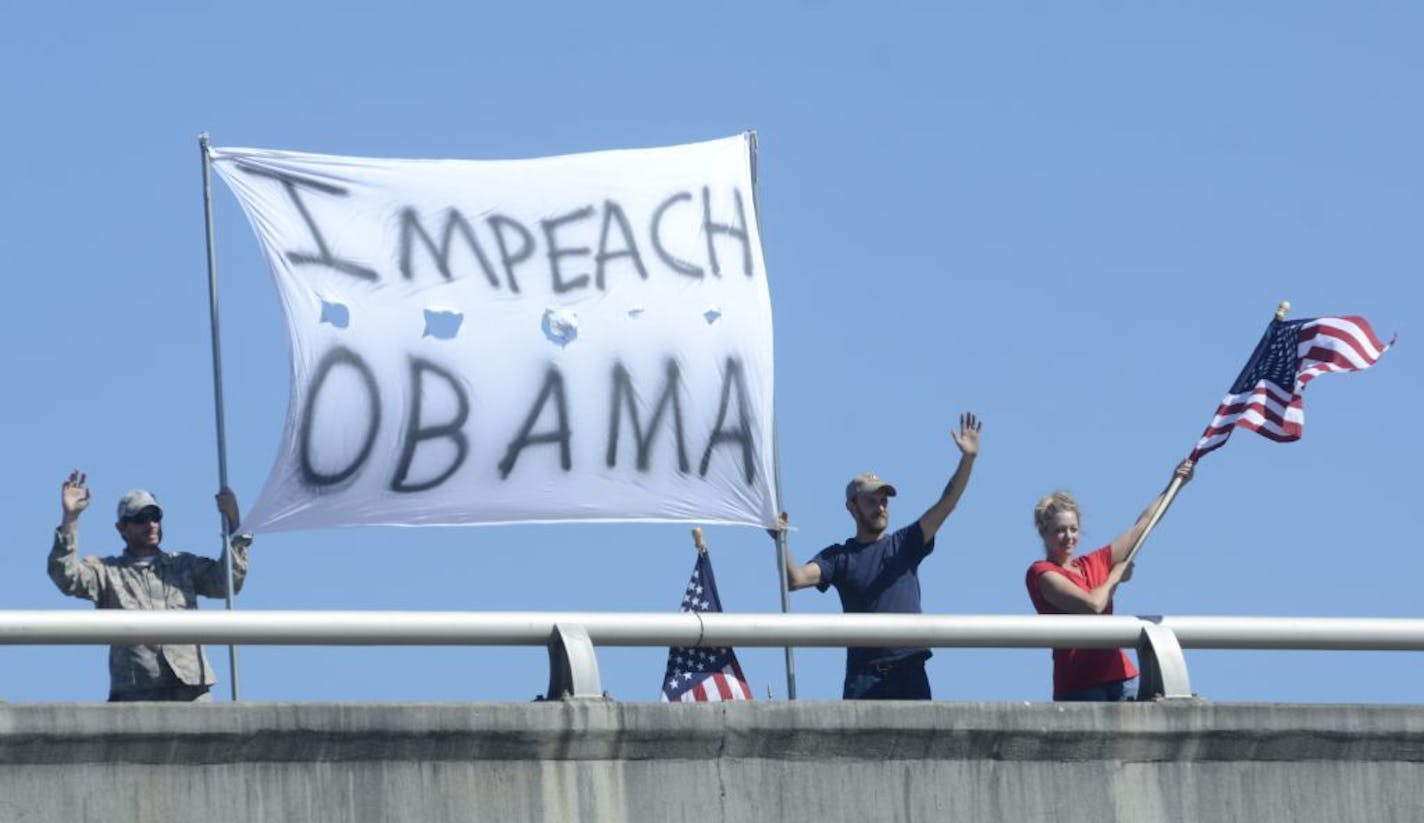 Some western Wisconsin residents have been holding anti-Obama protests on interstate overpasses, like this one in Chattanooga, Tenn. earlier this month.