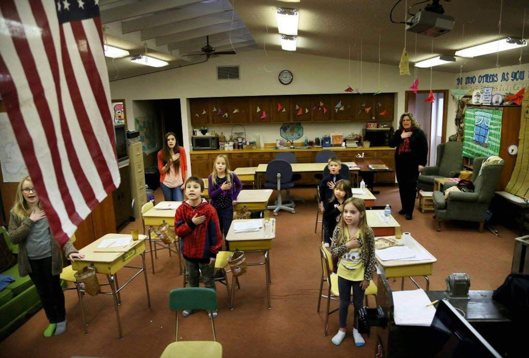 At Angle Inlet School, the last one-room schoolhouse in Minnesota, the school day started with the Pledge of Allegiance. This photo was taken in 2015.