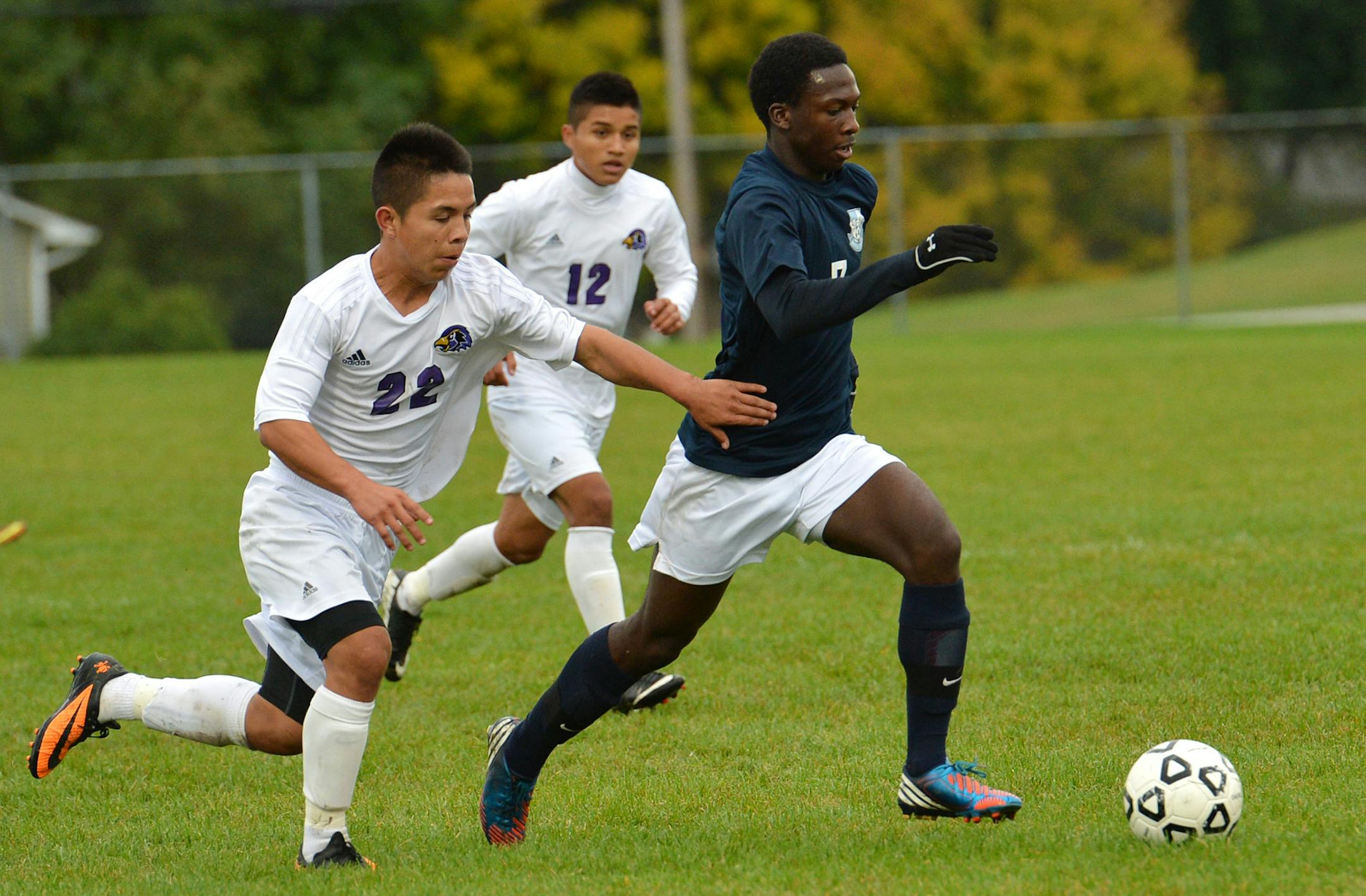 Blaine’s Asher Bates dribbled the ball past Chaska’s Freddy Vences toward the net Saturday. Blaine is ranked No. 1 in the state after finishing second last year.