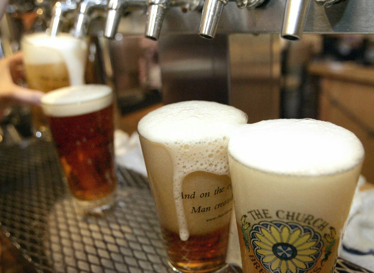 FILE - In this June 6, 2008 file photo, a row of freshly poured draft beers are seen in Pittsburgh. Don&#xed;t want to be confronted with the number of calories in that margarita or craft beer? Avoid the menu and order at the bar. New menu labeling rules from the Food and Drug Administration will require chain restaurants with 20 or more outlets to list the amount of calories in alcoholic drinks, along with other foods, on menus by next November. The idea is that people often don't know _ or eve