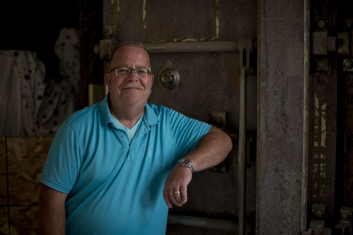 Philip Gagne poses for a portrait next to the original 19th century safe in the Rathskeller building. ] ALEX KORMANN &#x2022; alex.kormann@startribune.com The old Schmidt Brewing Co. brewery is a 15 acre site that has been historically preserved and repurposed all with the help of Philip Gagne, the last brewmaster for the company. One of the main buildings is being turned into a market place full of food vendors as well as a few miscellaneous vendors set to open in September. The largest buildin