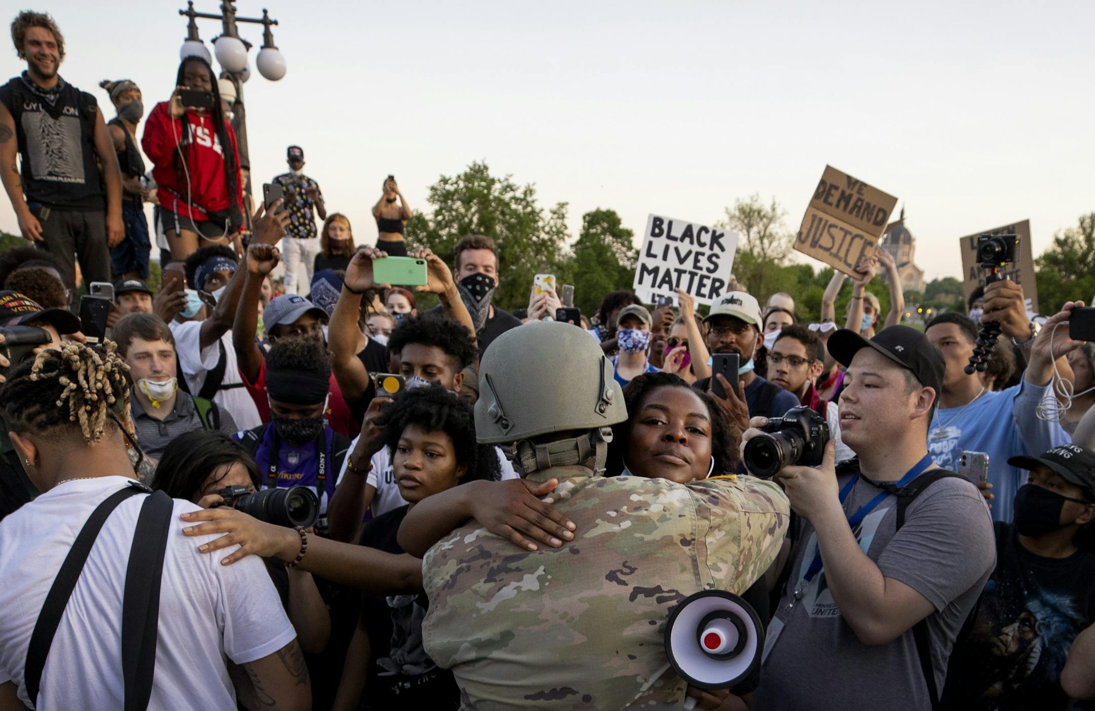 Master Sergeant Acie Matthews jr. hugged a protester at the Minnesota State Capitol in St. Paul.