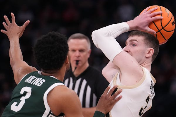 Purdue guard Braden Smith (3) looks to pass the ball against Michigan State in the second half of Friday's Big Ten quarterfinal at Target Center.