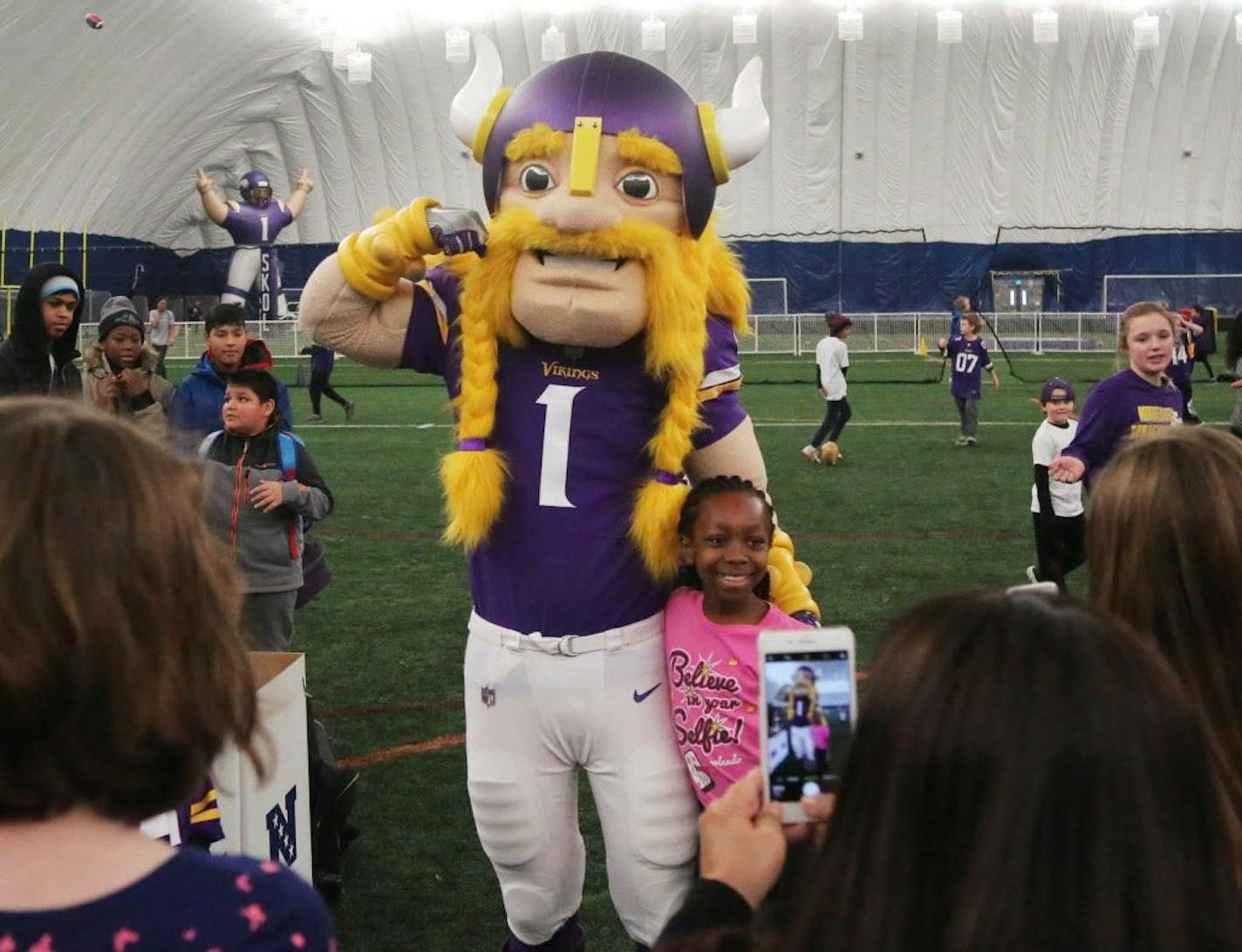 Tens of thousands of books, school supplies, sports equipments in the hands of underserved children in the greater Twin Cites area thanks to efforts of local students and the National Football League through a Super Bowl project called Super Kids-Super Sharing Thursday, Jan. 18, 2018, at the Braimar Field Dome in Edina, MN. Before the event had even ended 43,460 items had been collected by kids from various Minnesota school districts. Here, Victor the Viking was on hand and posed for photos with