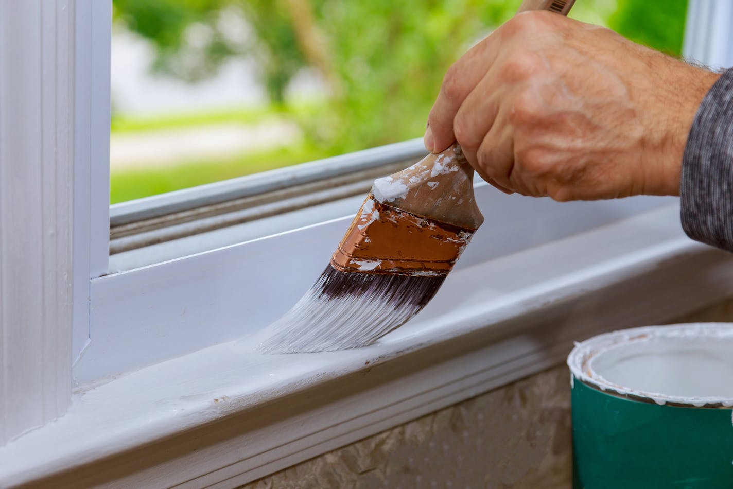 Summer is a good time for projects like repainting windowsills. (Dreamstime/TNS)