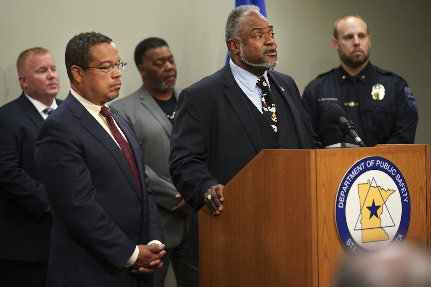 Attorney General Keith Ellison and Public Safety Commissioner John Harrington announce a working group and public hearings about what they call police officer-involved deadly force encounters, Monday, July 22, 2019 in St.Paul, Minn. (Richard Tsong-Taatarii/Star Tribune via AP)