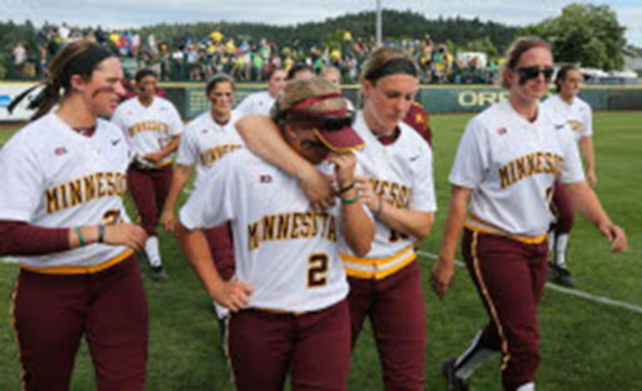 Sophomore Paige Palkovich consoled senior outfielder Bree Blanchette after the Gophers’ season ended.