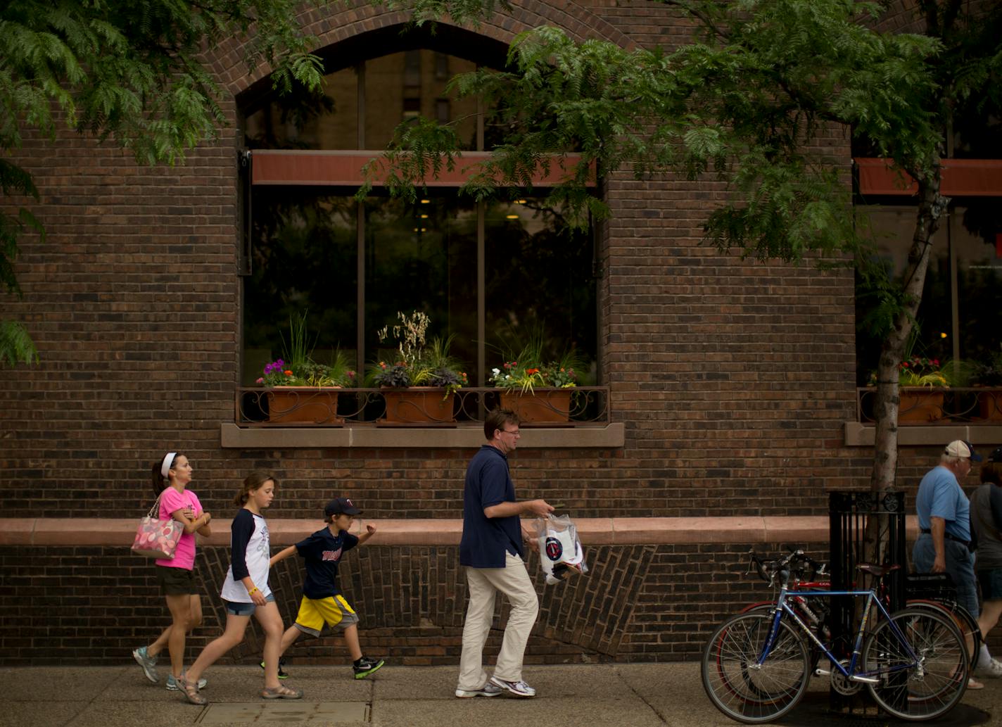 People walking in front of Butler Square.