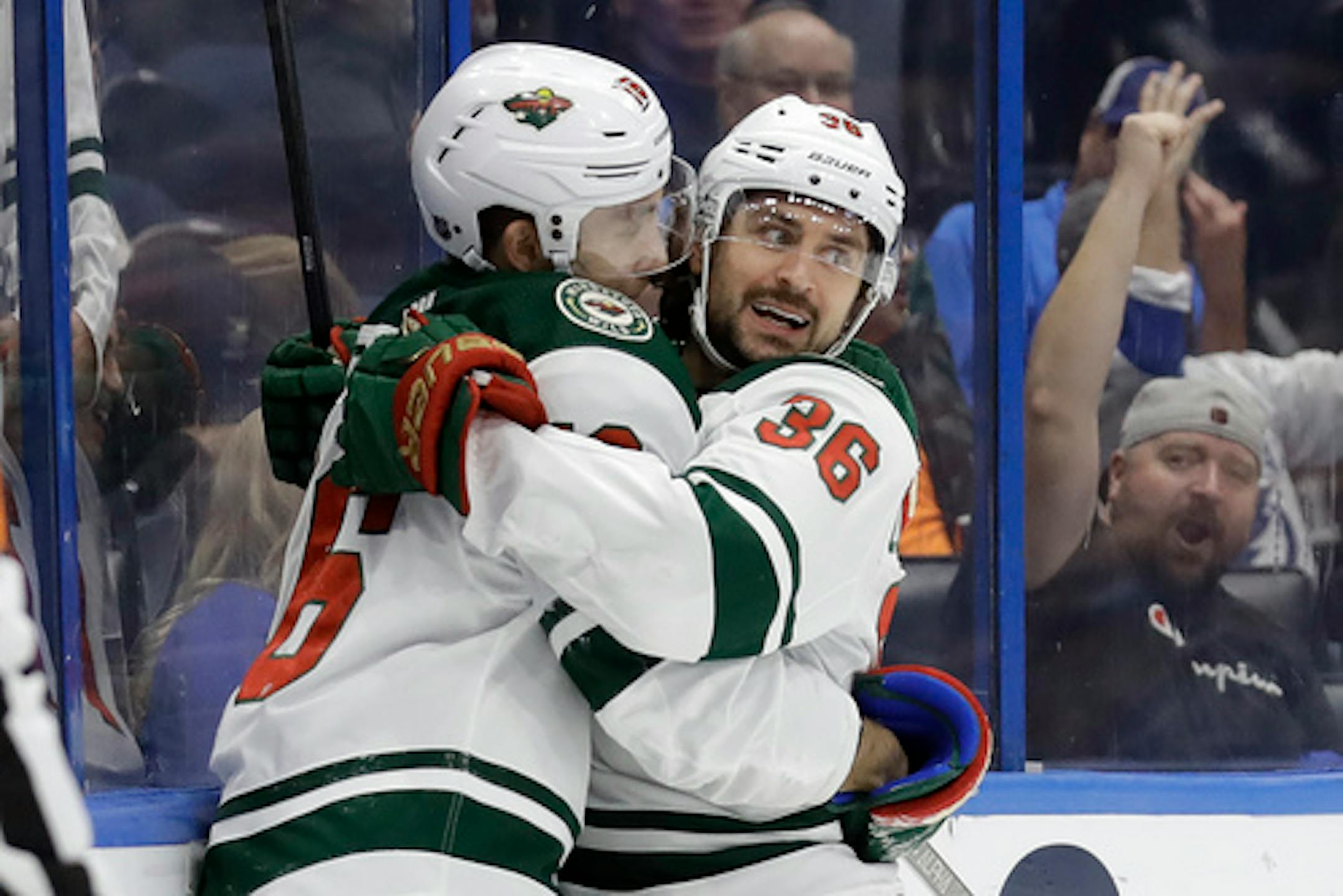 The Wild's Mats Zuccarello, right, celebrated with Jason Zucker after scoring the go-ahead goal in the third period of Minnesota's 5-4 victory over Tampa Bay on Thursday.
