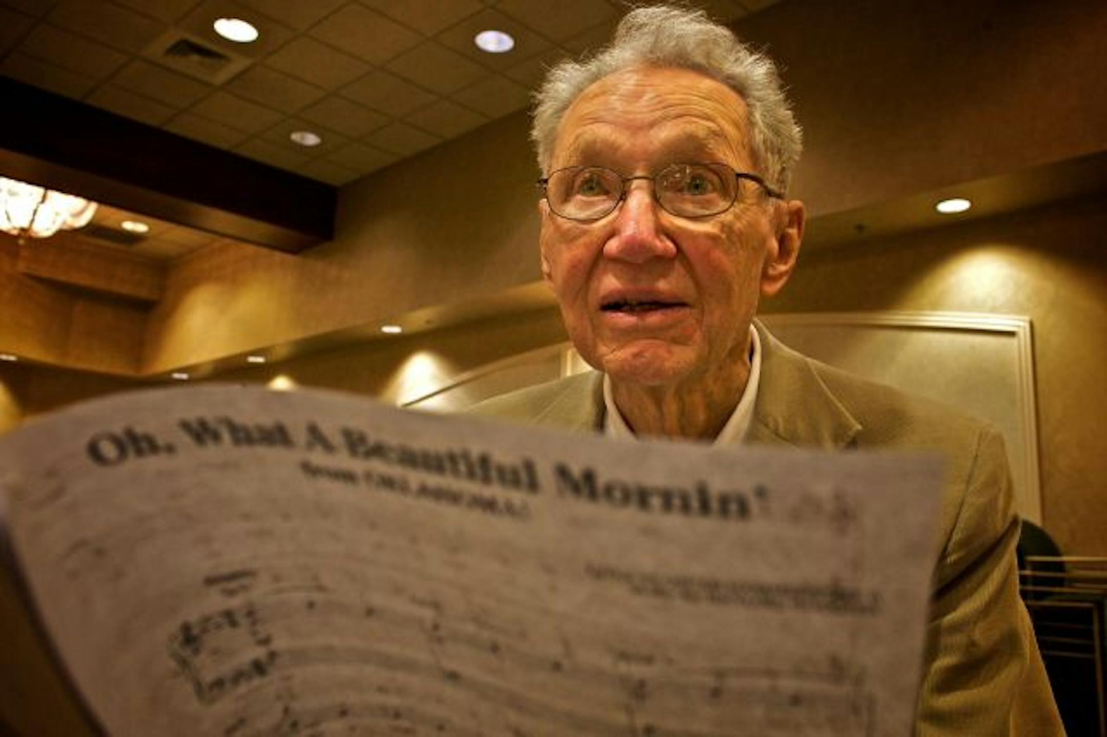 Stuart MacPhail, son of founder of MacPhail Center for Music, 90 sings "Oh, What a Beautiful Mornin!" with the rest of the residents who attended the "Sing for Your Life" group at Friendship Village.