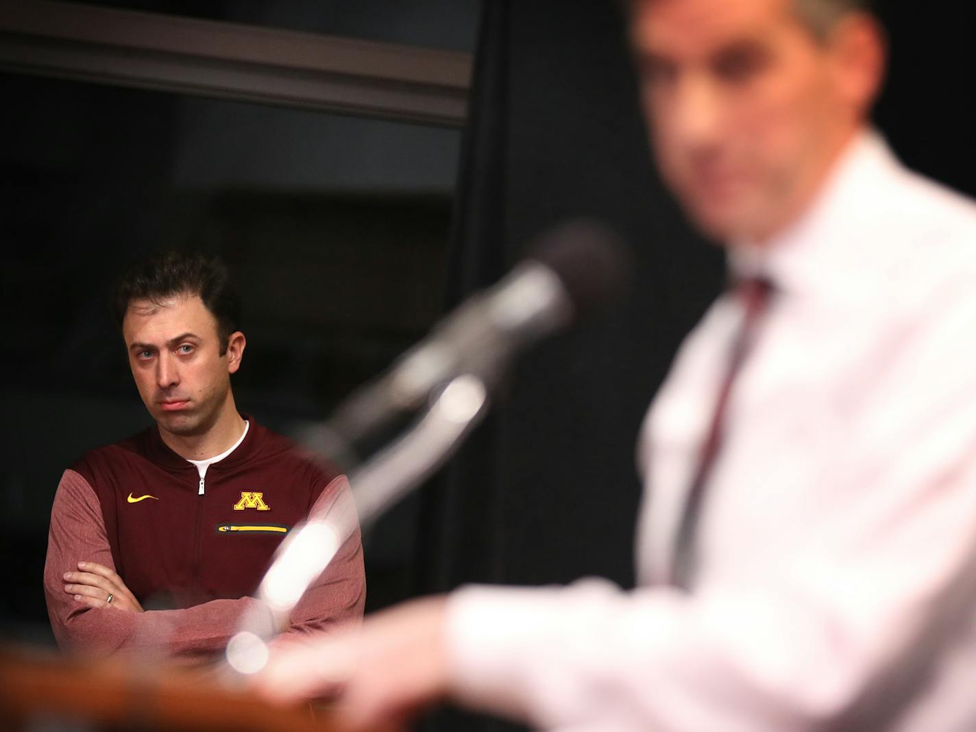 Basketball coach Richard Pitino watches as Mark Coyle speaks during a press conference. ] LEILA NAVIDI &#xef; leila.navidi@startribune.com BACKGROUND INFORMATION: University of Minnesota athletic director Mark Coyle speaks during a press conference at Williams Arena on Friday, January 5, 2018.