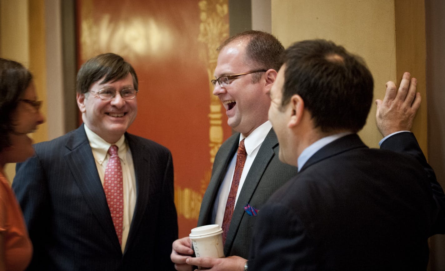 Richard Carlbom, center, campaign manager for Minnesotans United was the main organizer for the effort to pass the marriage bill.