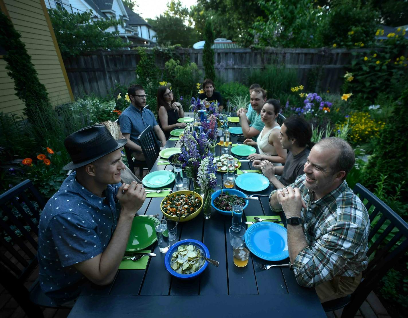 The setting for an outdoor dinner party last July, above, where guests included brothers Rocky Finlay and Ryan Finlay.